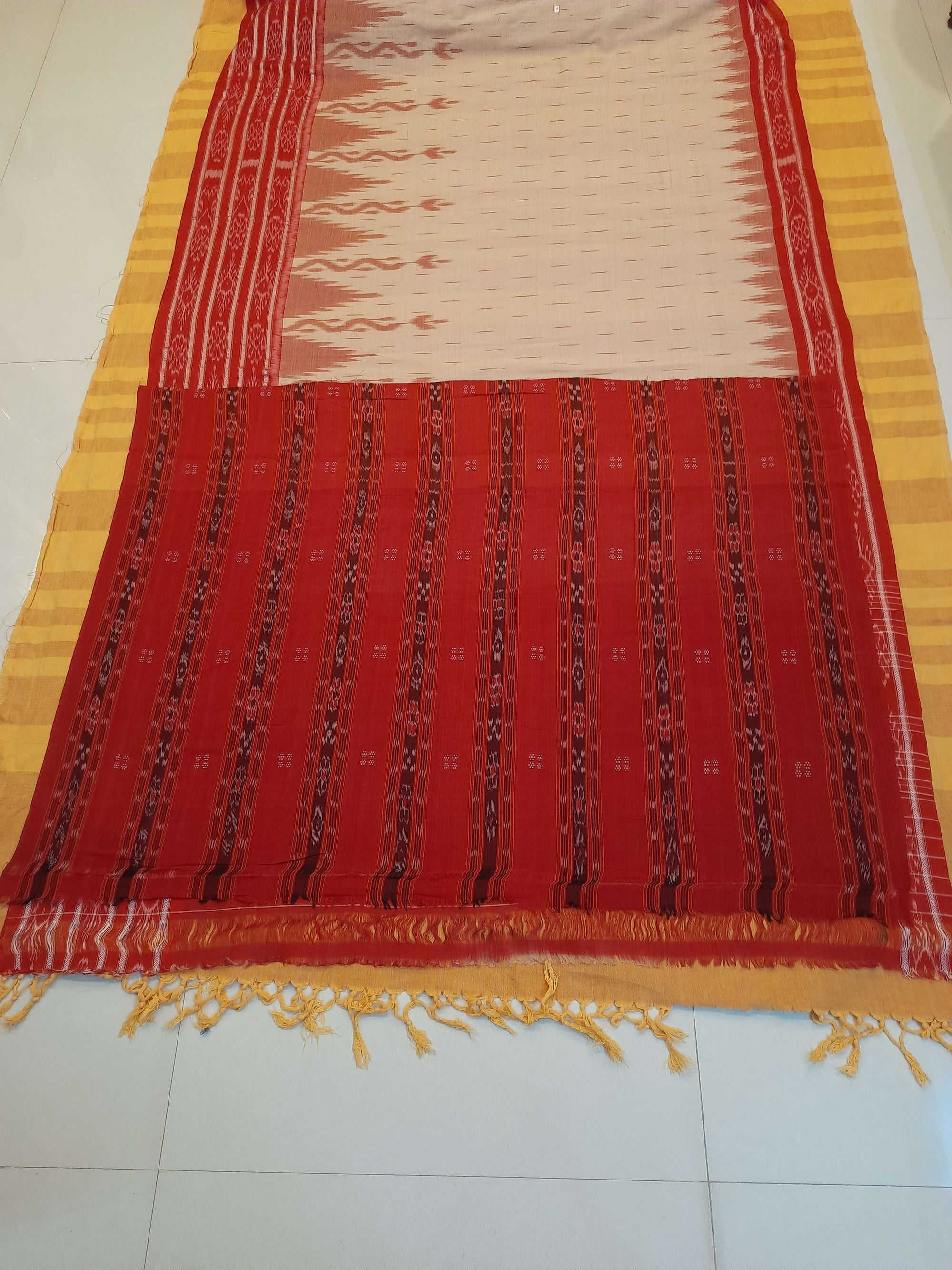 Beige wide border Cotton Odisha Ikat saree  with mix match cotton ikat blouse