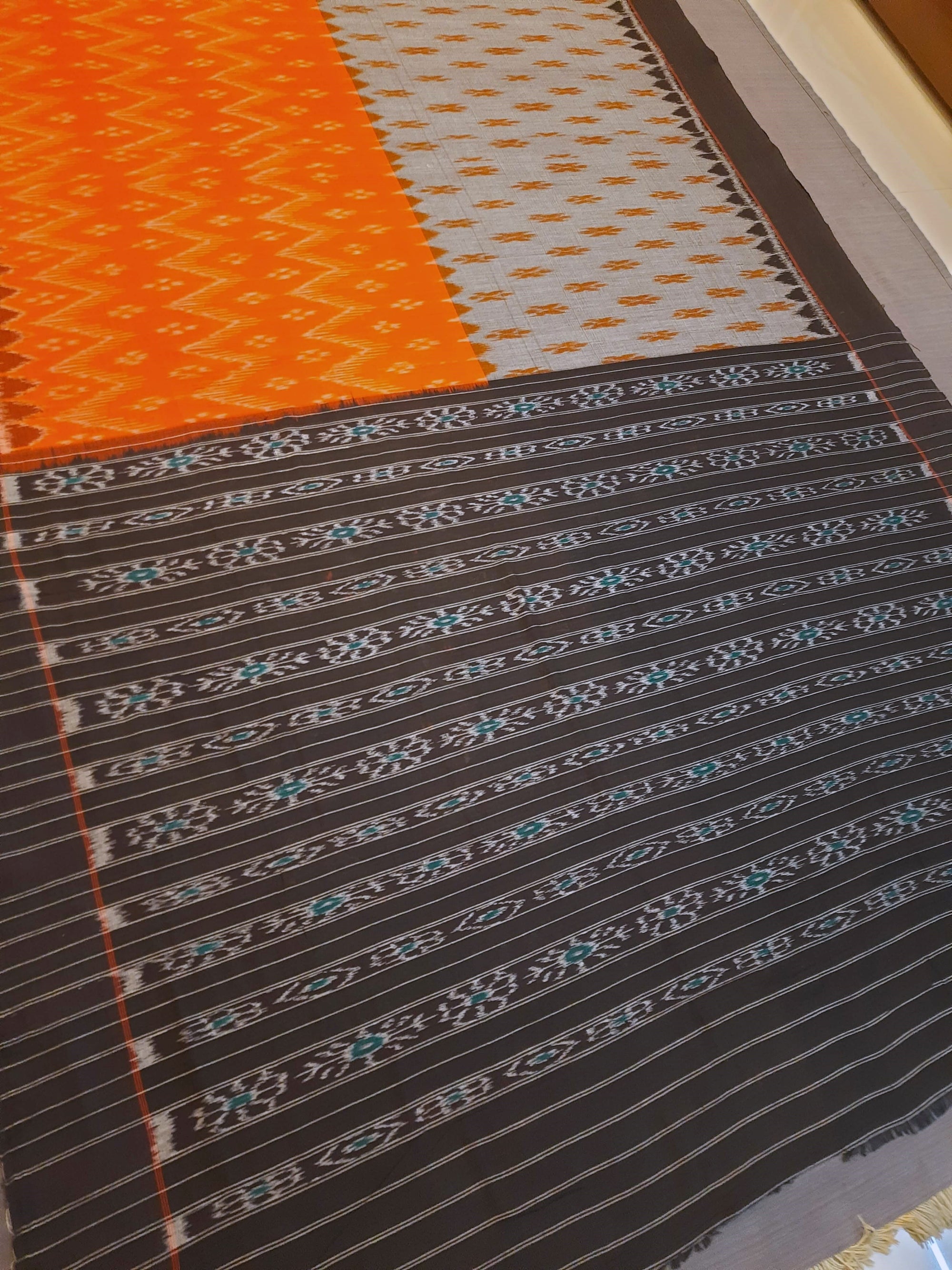 Grey Orange half half colored body Odisha Ikat saree with cotton ikat blouse piece