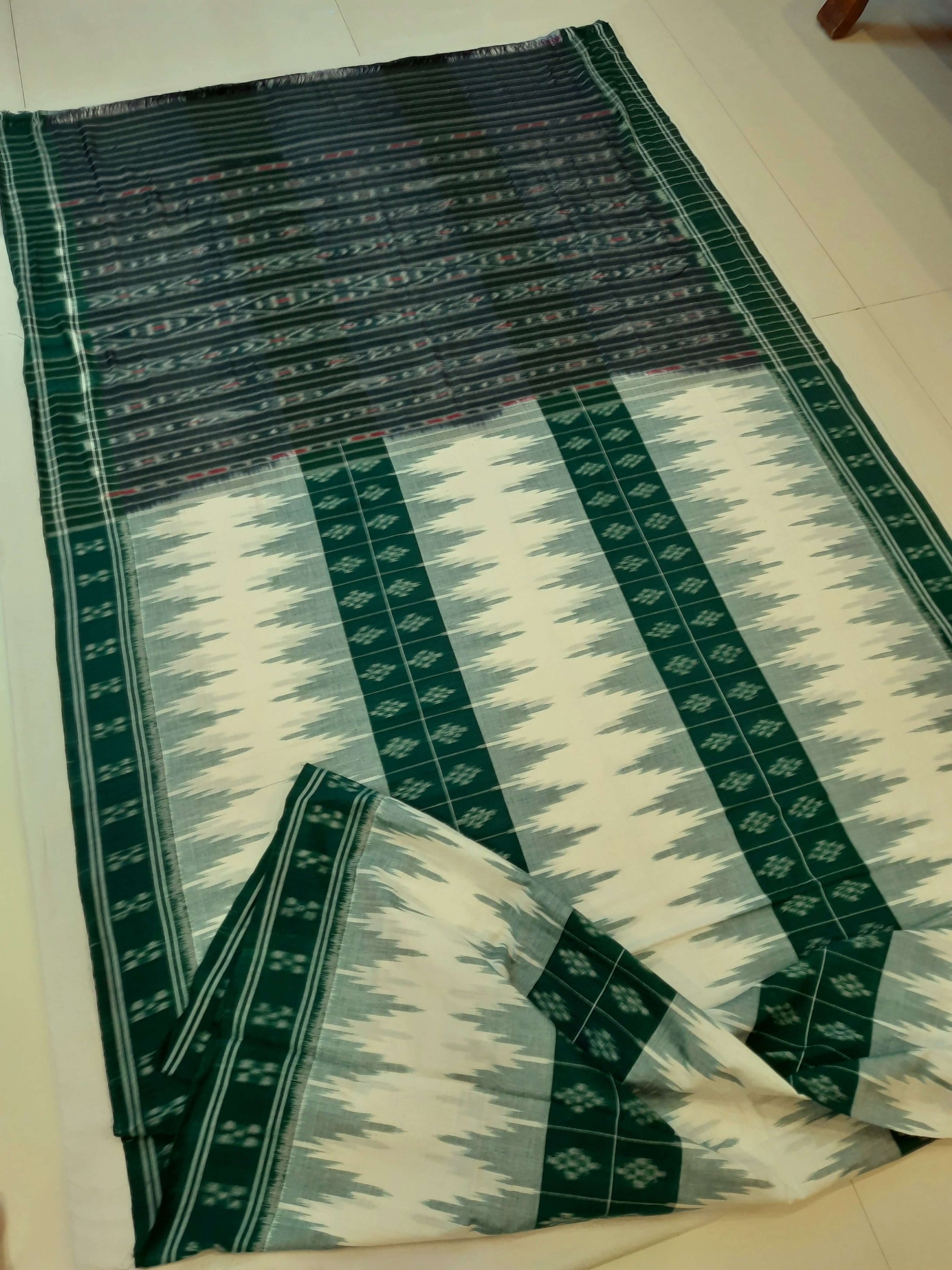 White and Green Cotton Odisha Ikat saree with mix match blouse piece