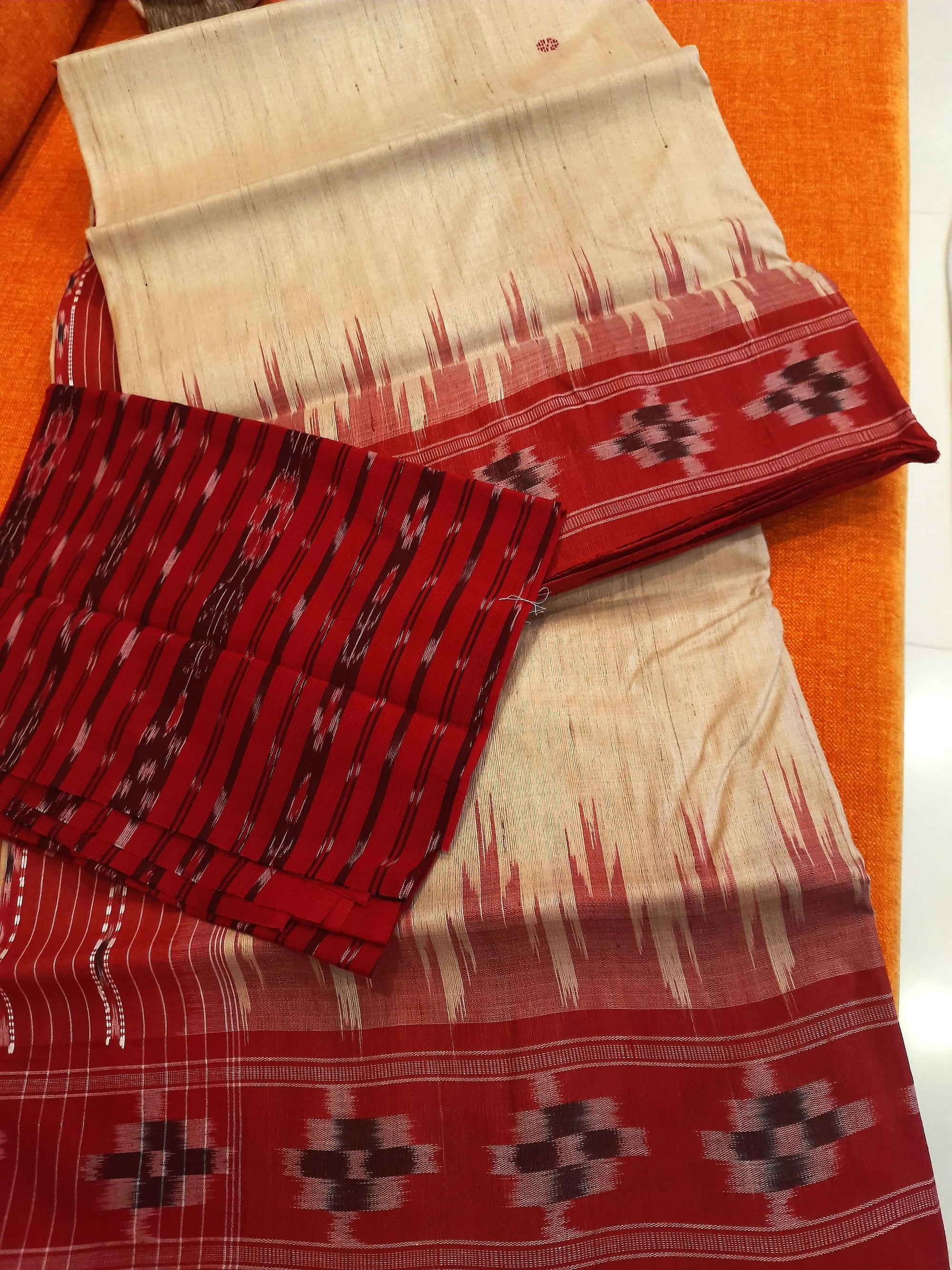 Beige with Red Tussar Silk Odisha Ikat Saree paired with cotton ikat blouse piece