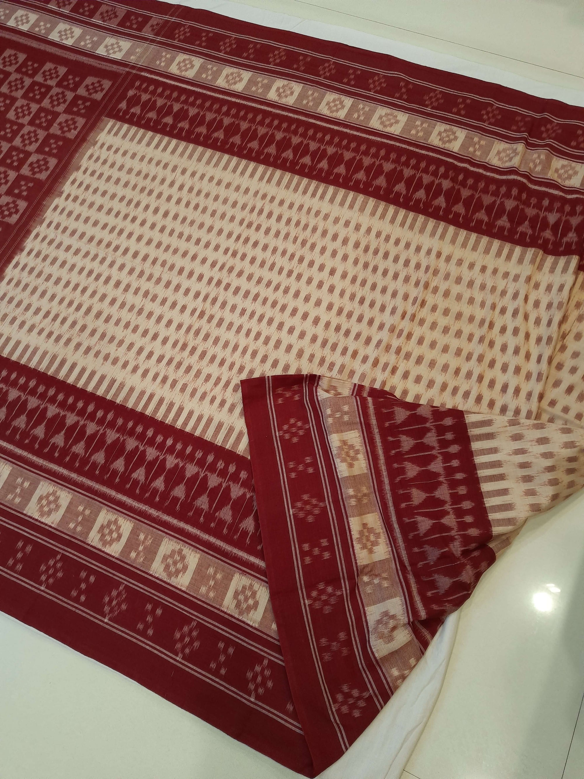 Beige wide border Cotton Odisha Ikat saree with matching cotton ikat blouse piece