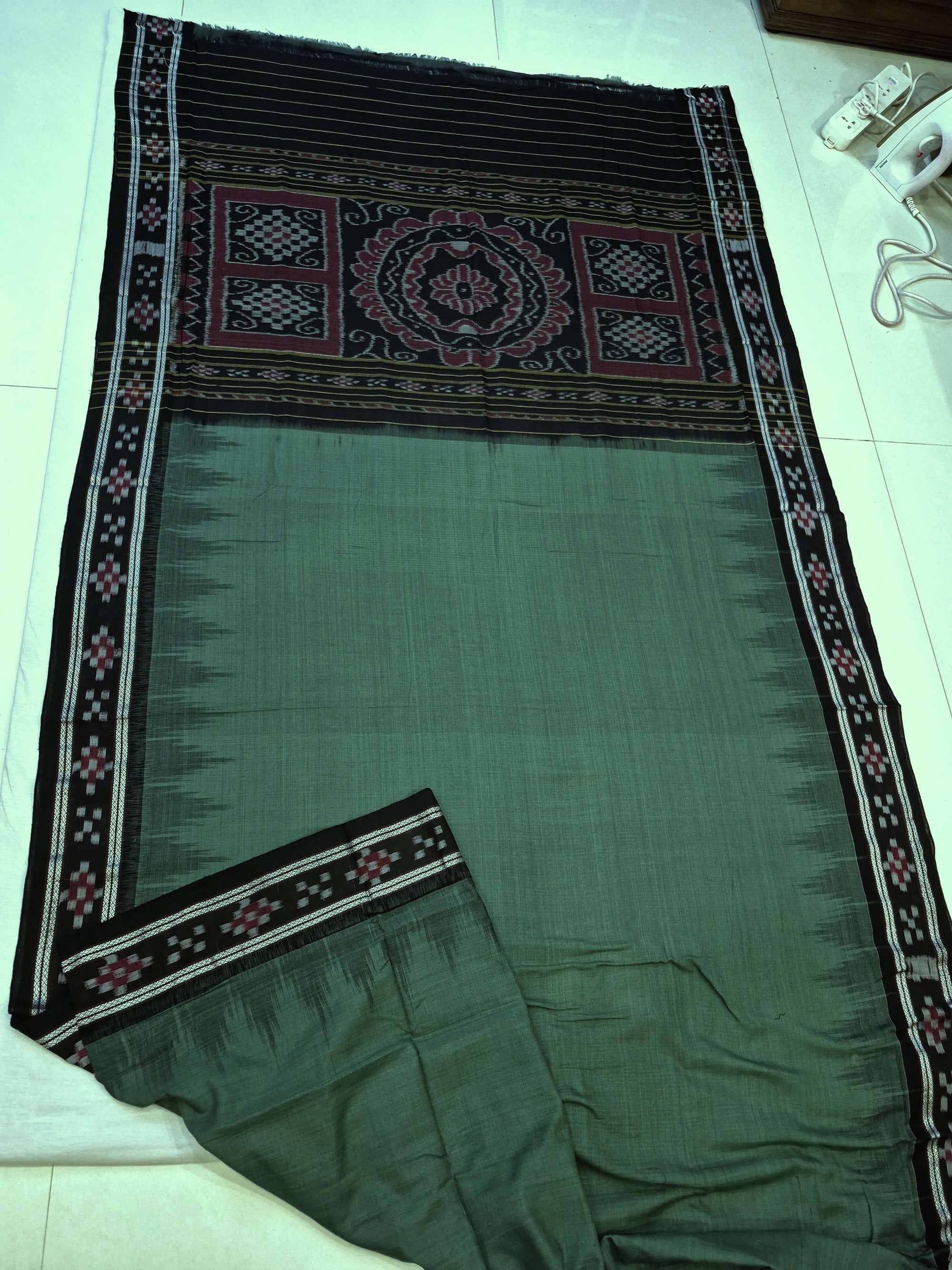Green Black Odisha Ikat saree with cotton ikat blouse piece