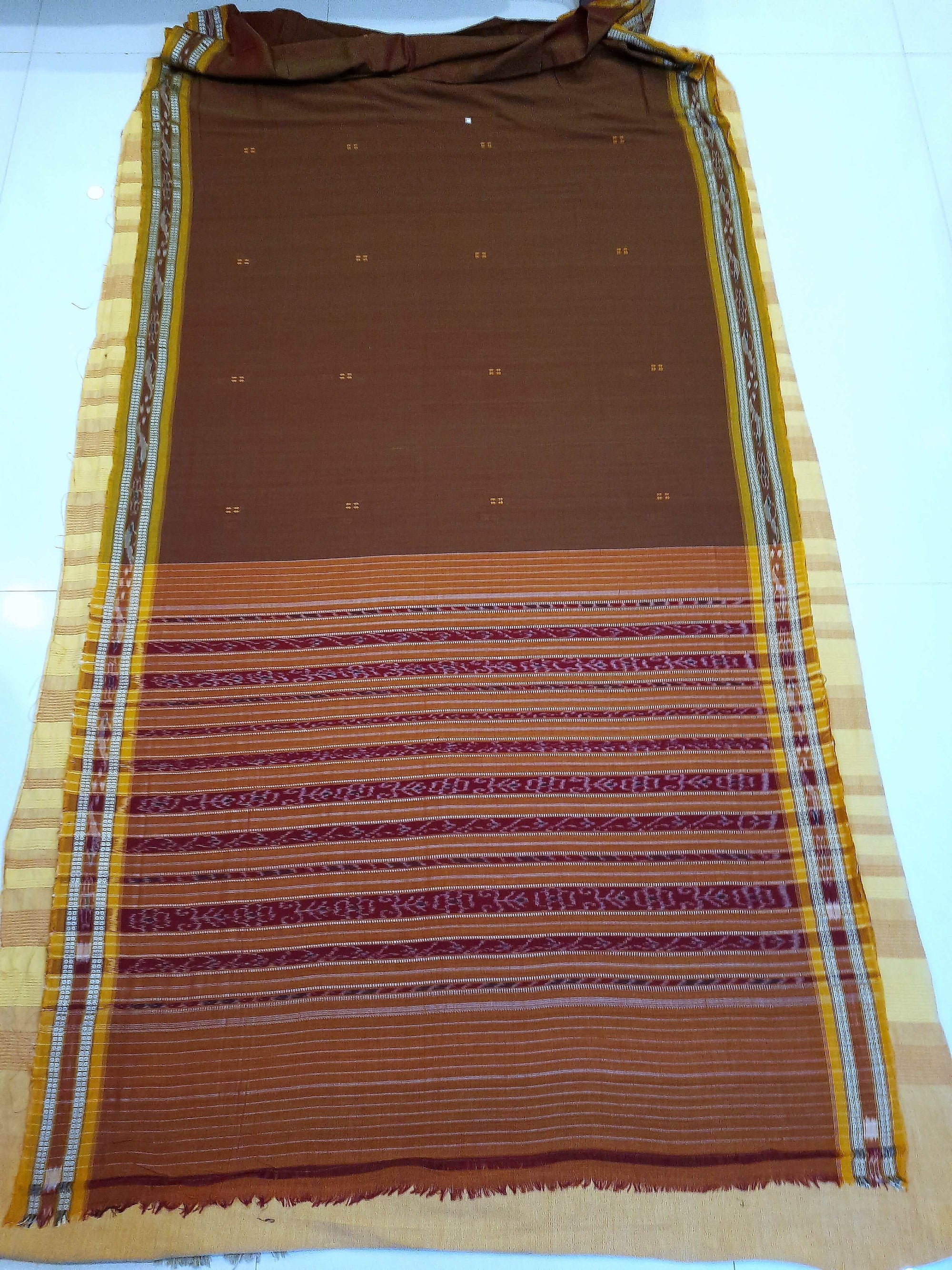 Brown with Golden Odisha Ikat saree  with cotton ikat blouse piece