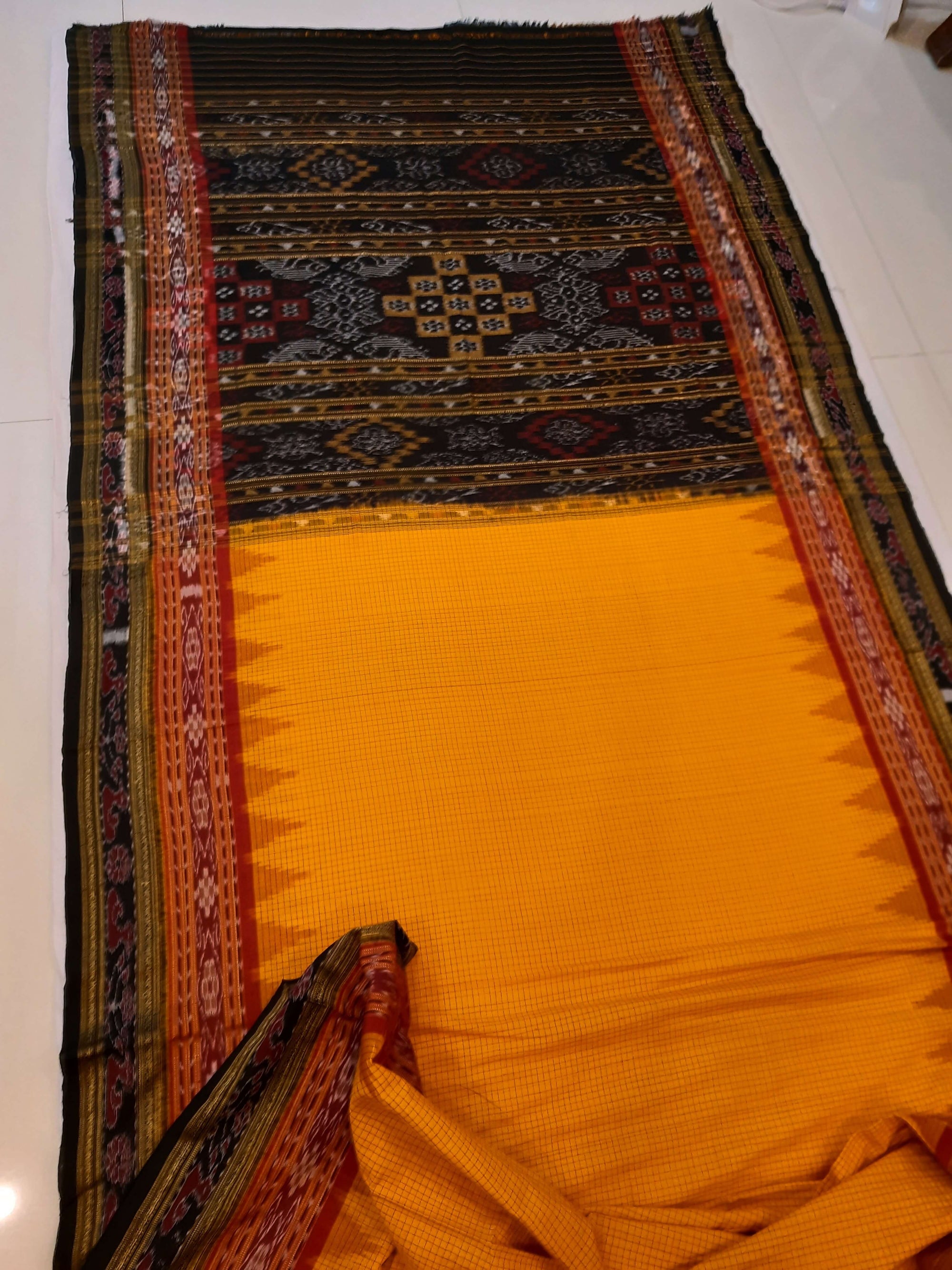 Yellow double order Sachipar Nuapatna Cotton Ikat saree with cotton ikat blouse piece