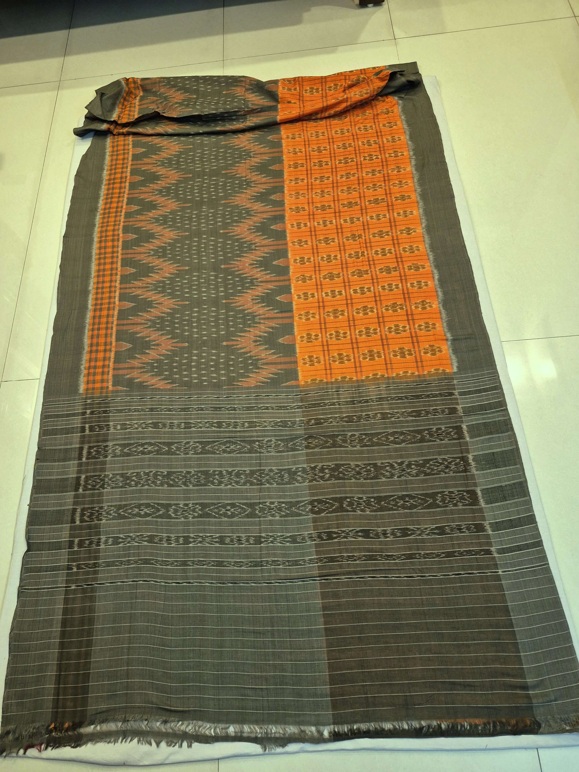 Grey Orange half half body coloured Odisha Ikat saree with cotton ikat blouse piece