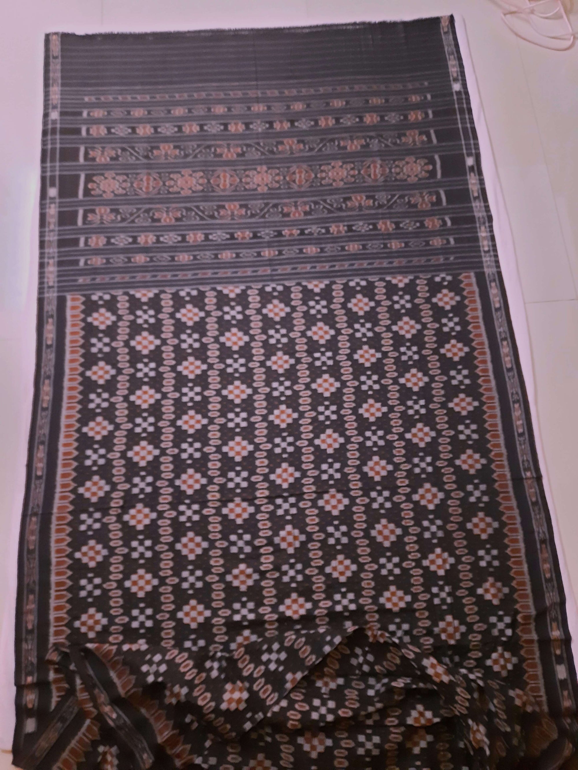 Black Cotton Ikat saree with cotton ikat blouse piece
