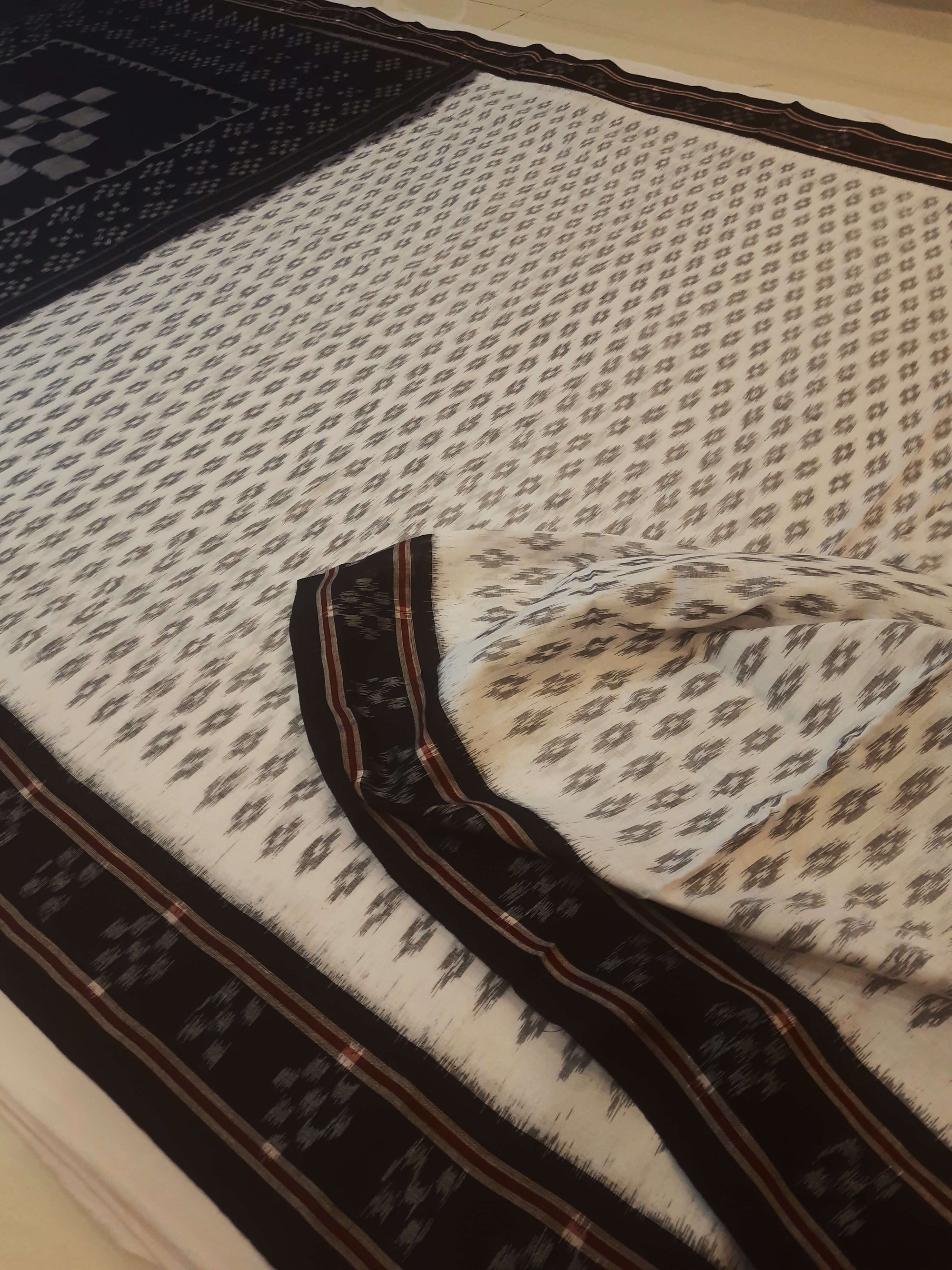 White with Black cotton Odisha Ikat Saree with mix match cotton Ikat blouse piece