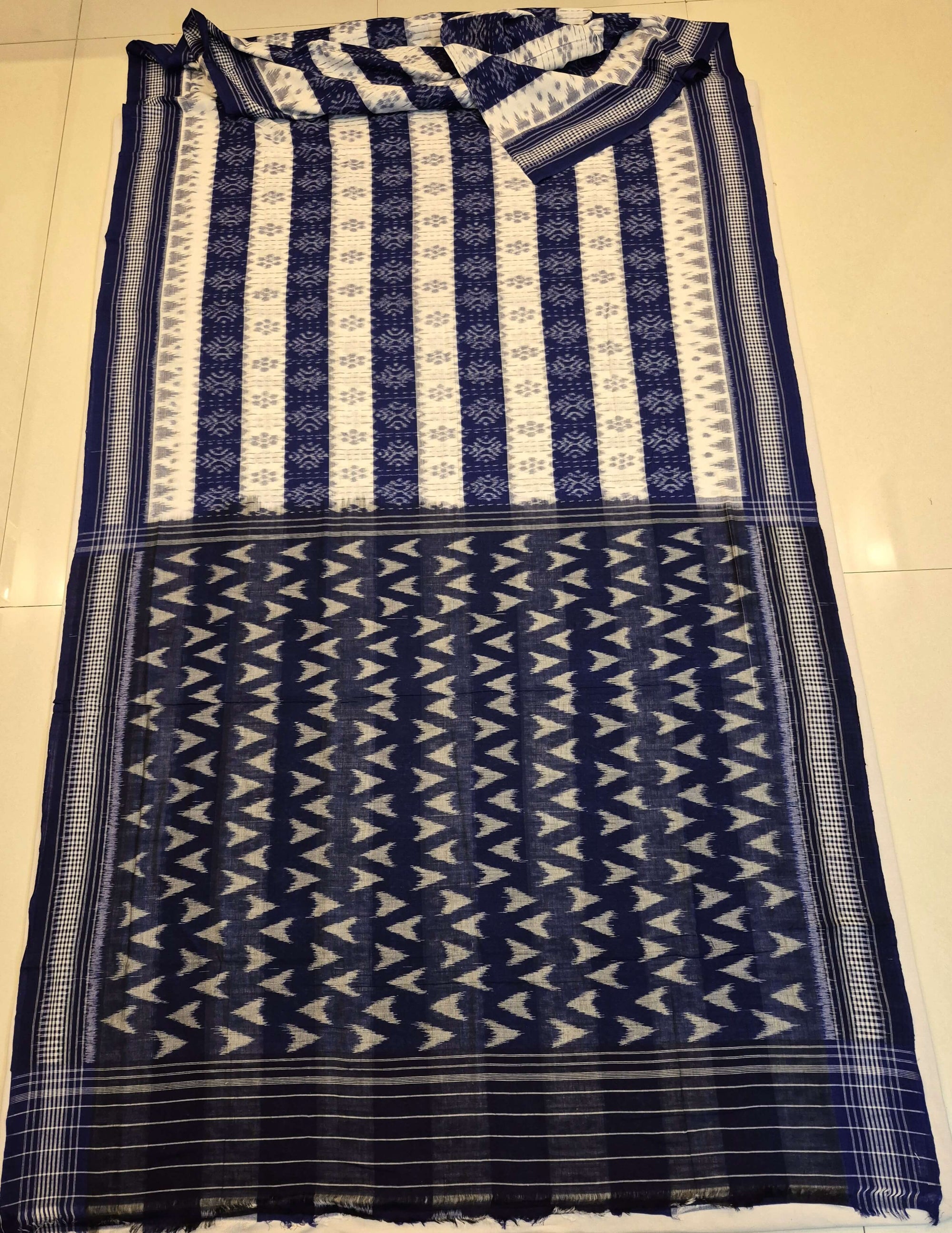 White with Blue Cotton Odisha Ikat saree with cotton ikat blouse piece