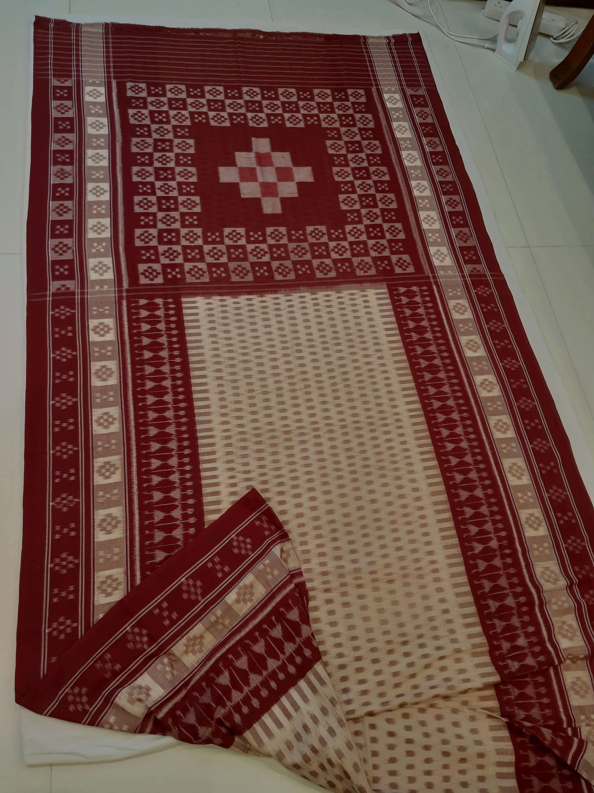 Beige wide border Cotton Odisha Ikat saree with matching cotton ikat blouse piece