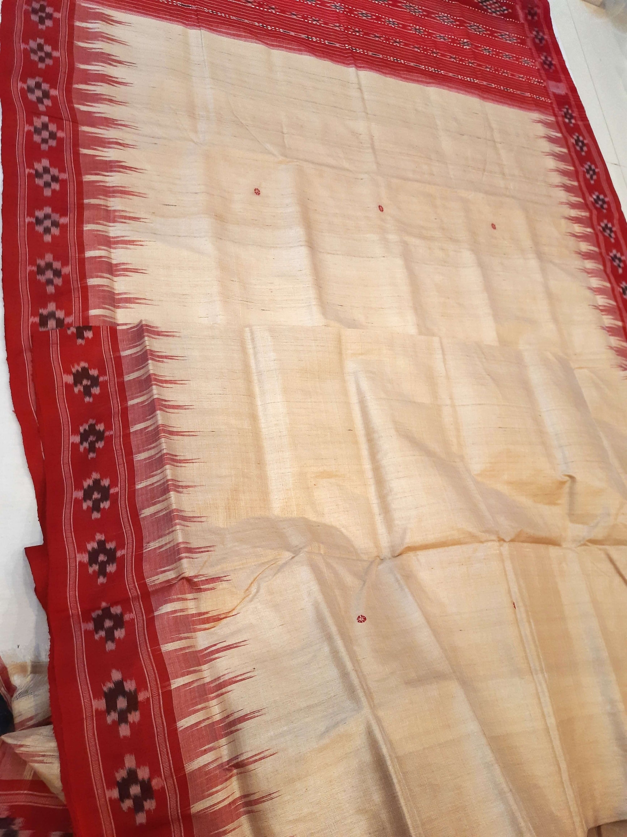 Beige with Red Tussar Silk Odisha Ikat Saree paired with cotton ikat blouse piece