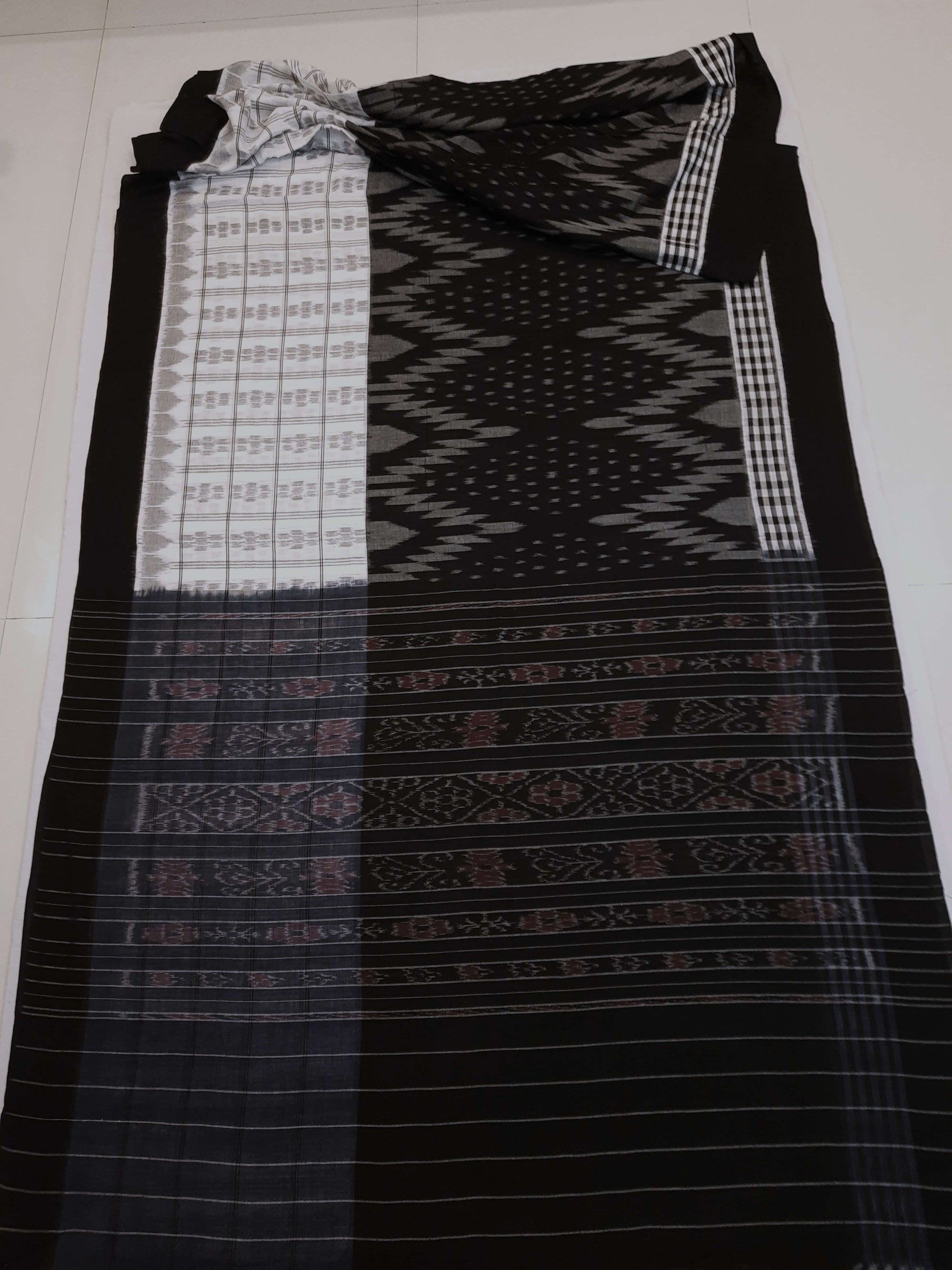 Black and White half half body coloured Odisha Ikat saree with cotton ikat blouse piece