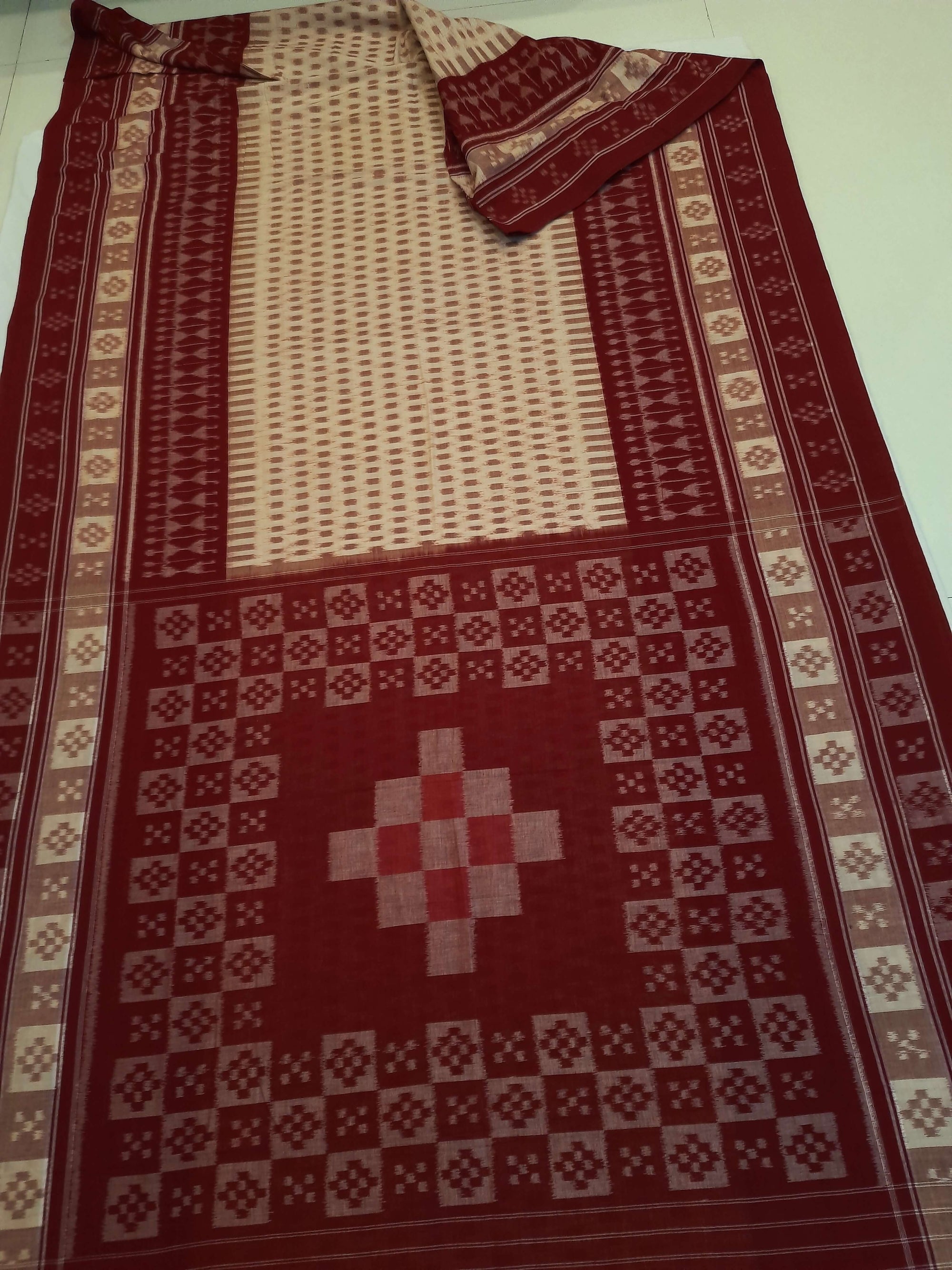 Beige wide border Cotton Odisha Ikat saree with matching cotton ikat blouse piece