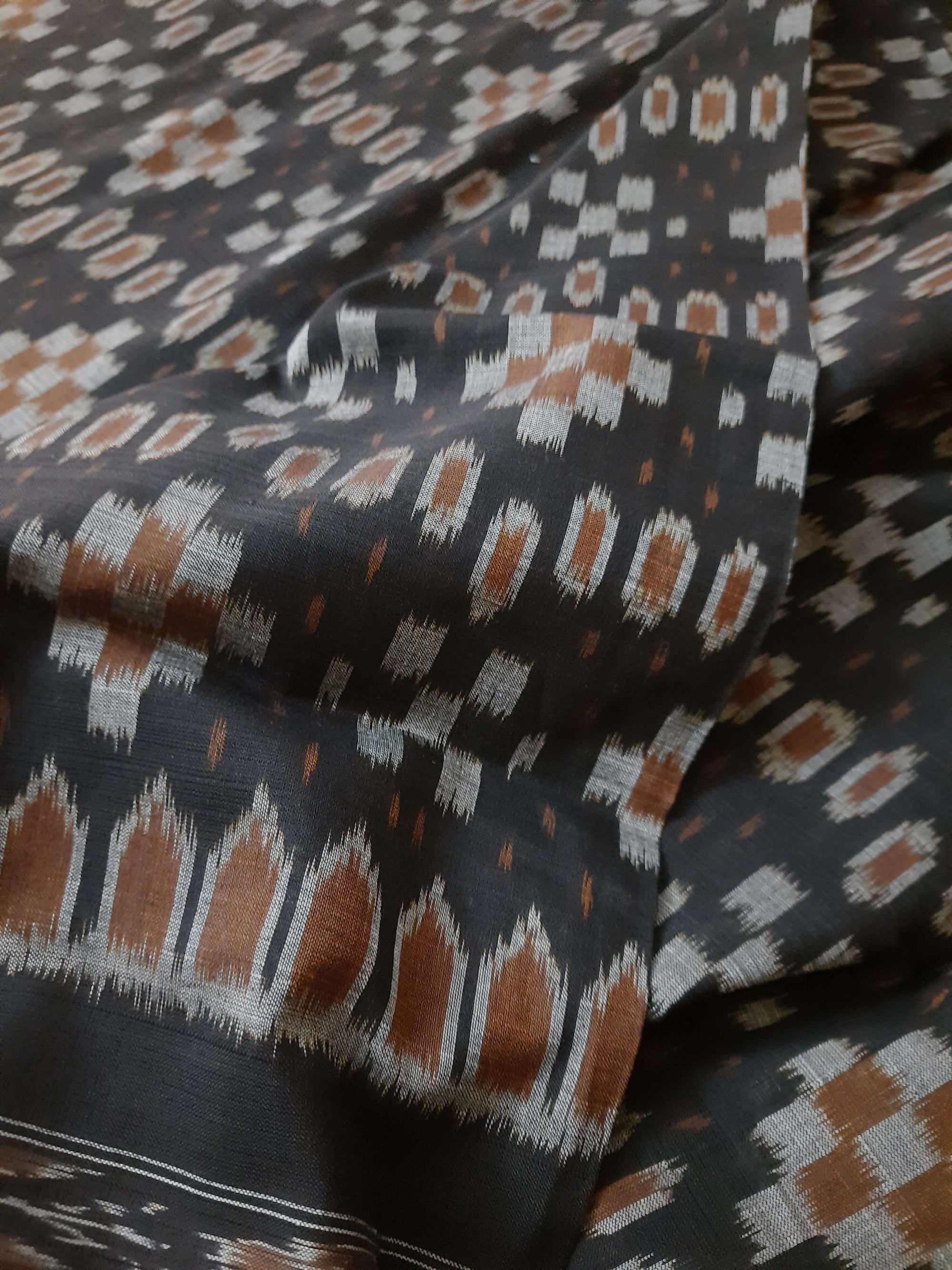 Black Cotton Ikat saree with cotton ikat blouse piece
