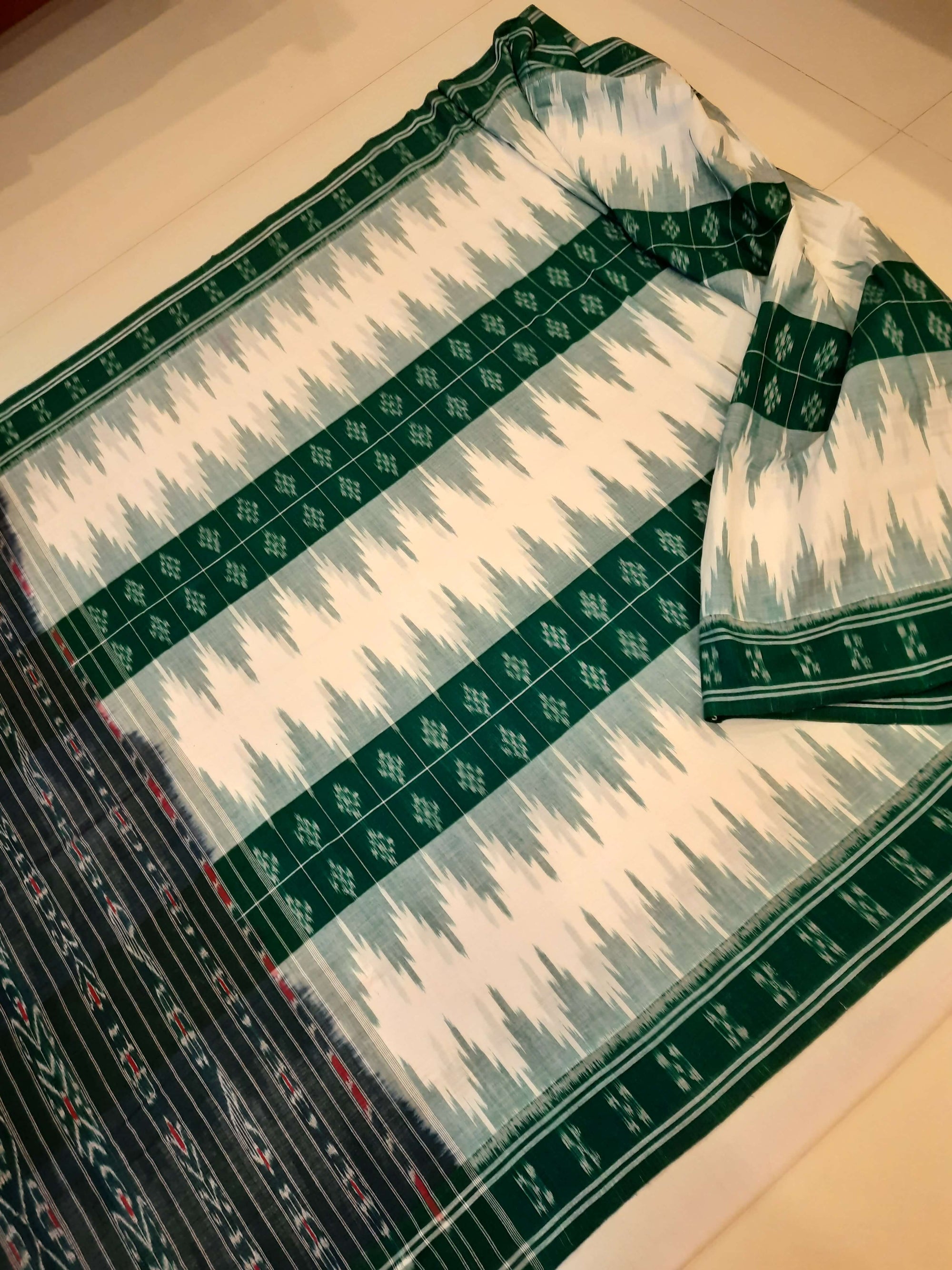 White and Green Cotton Odisha Ikat saree with mix match blouse piece