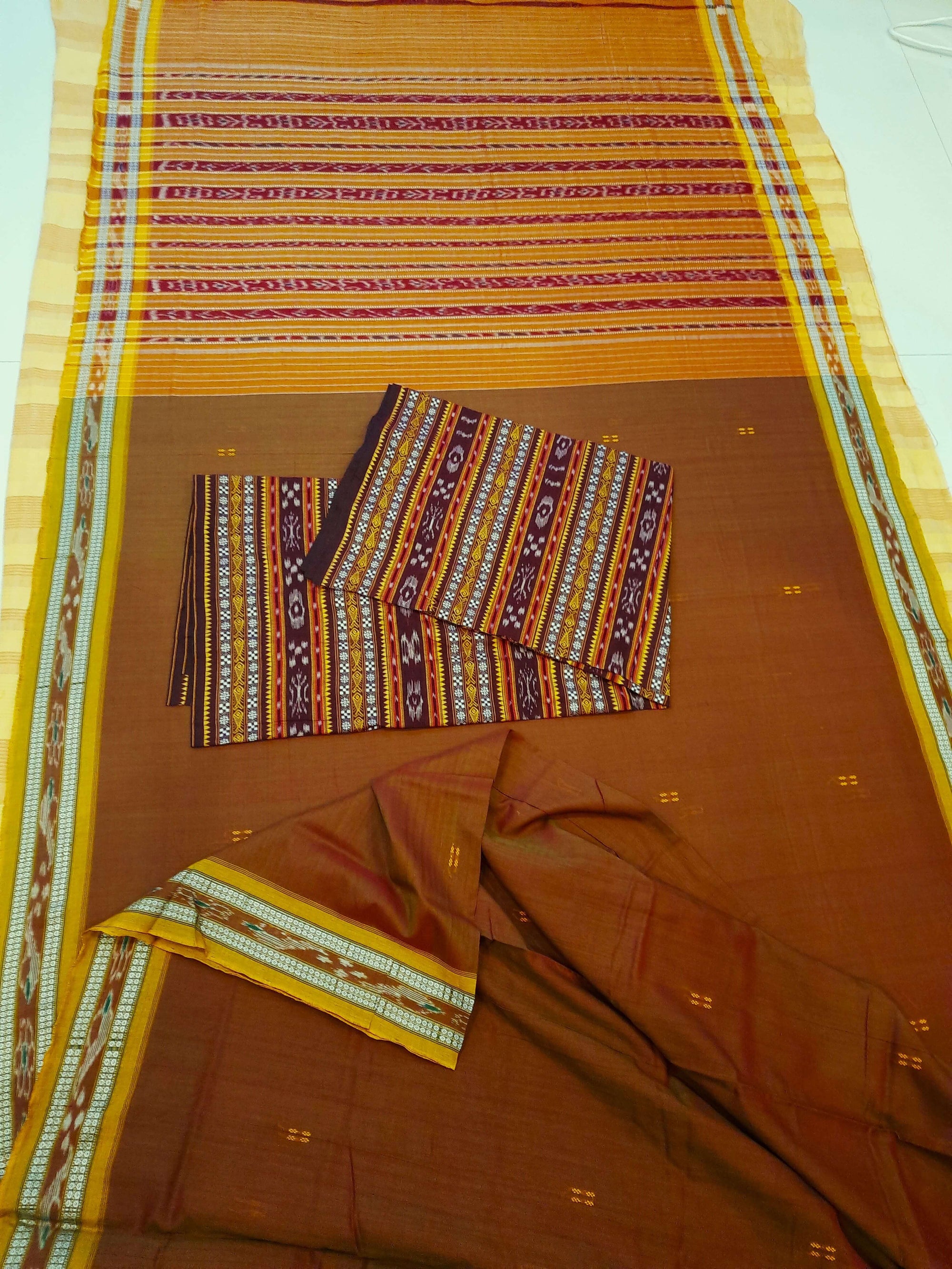 Brown with Golden Odisha Ikat saree  with cotton ikat blouse piece