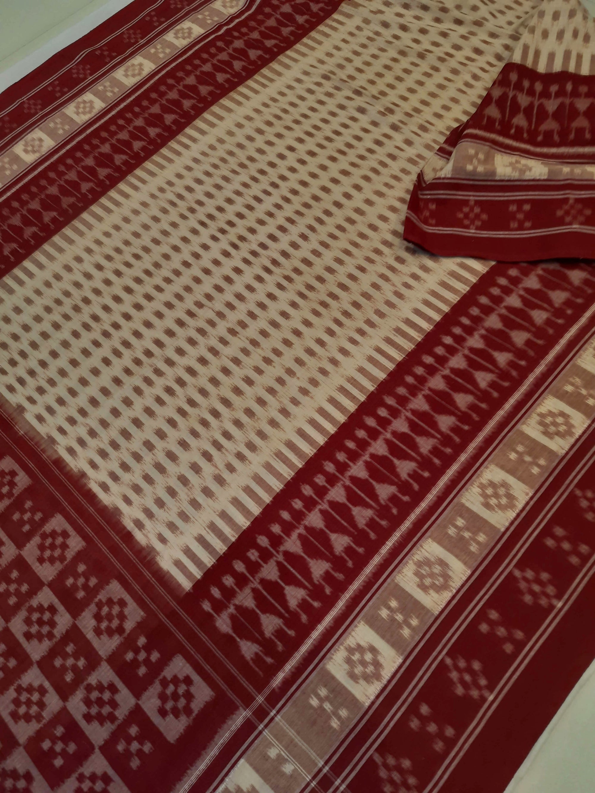Beige wide border Cotton Odisha Ikat saree with matching cotton ikat blouse piece