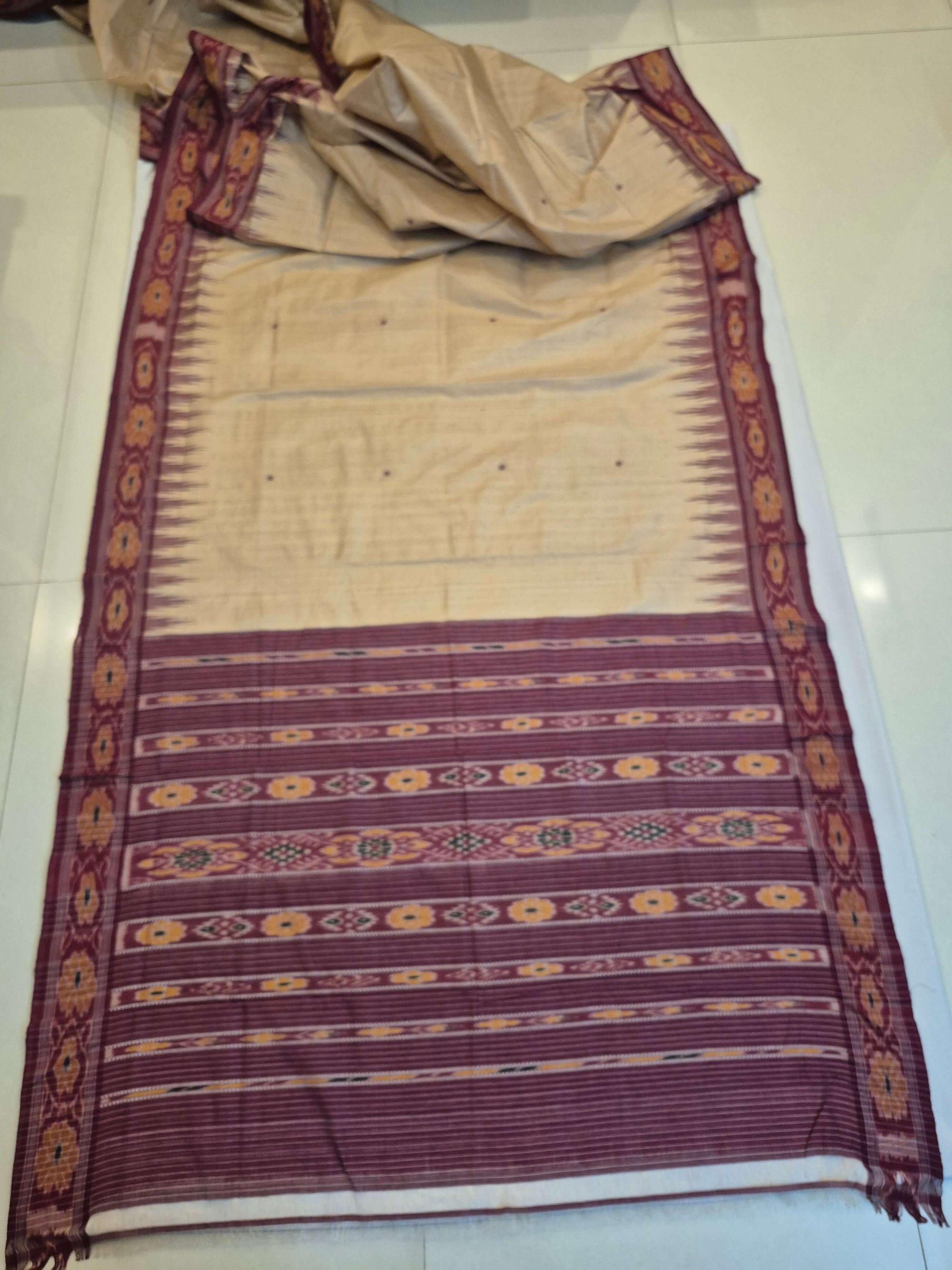 Beige with Maroon Tussar Silk Odisha Ikat Saree paired with cotton ikat blouse piece