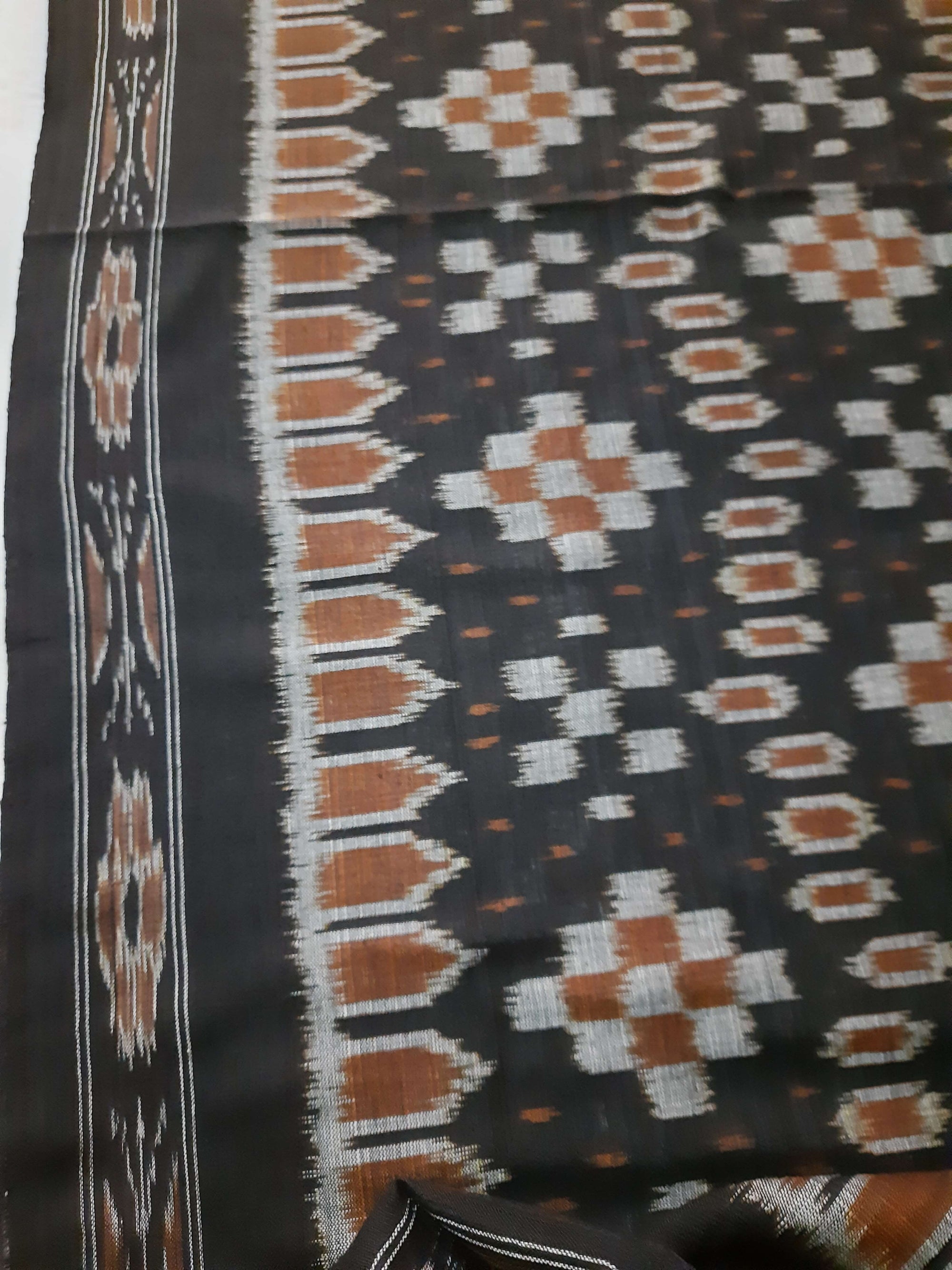 Black Cotton Ikat saree with cotton ikat blouse piece