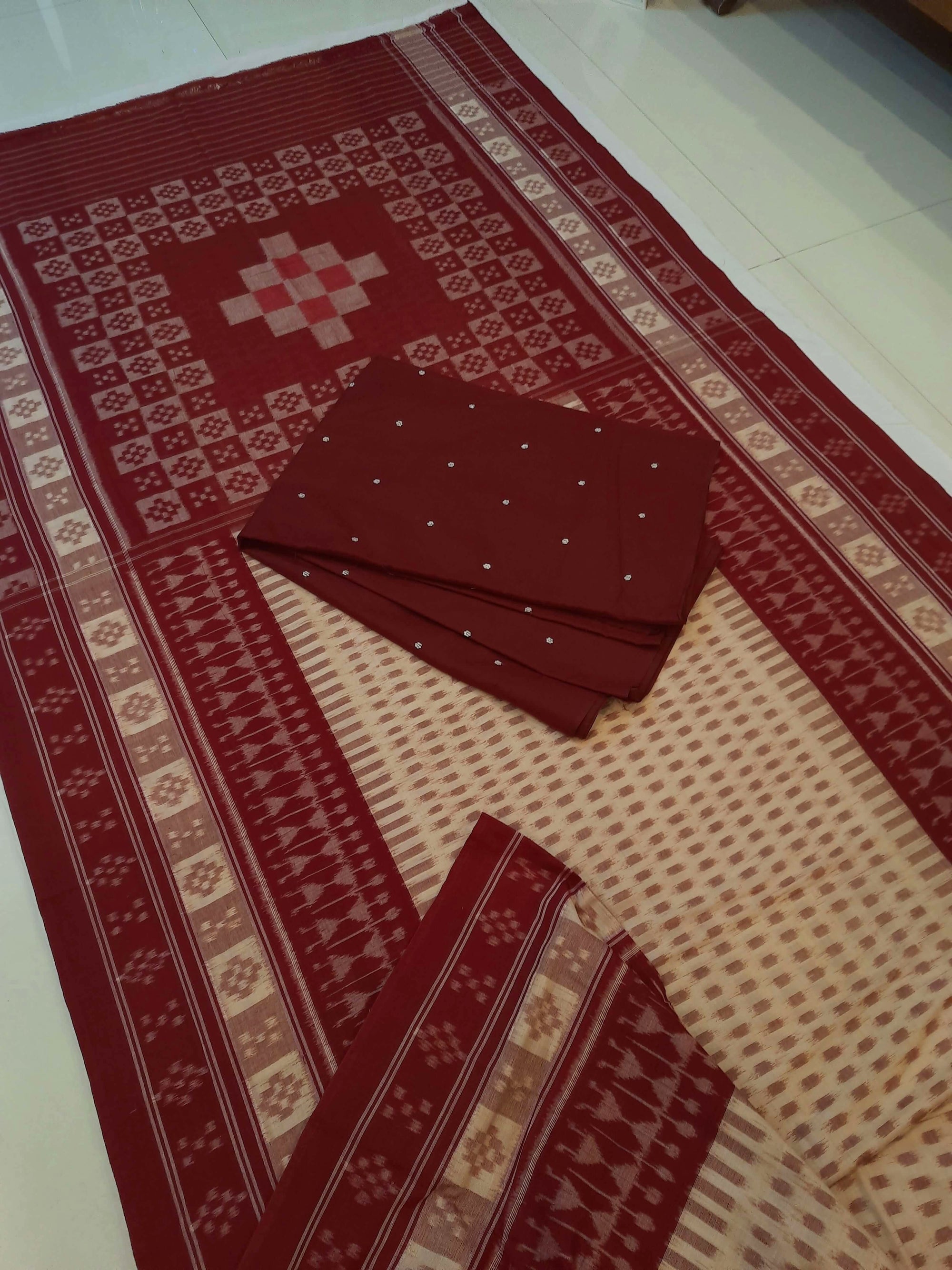 Beige wide border Cotton Odisha Ikat saree with matching cotton ikat blouse piece