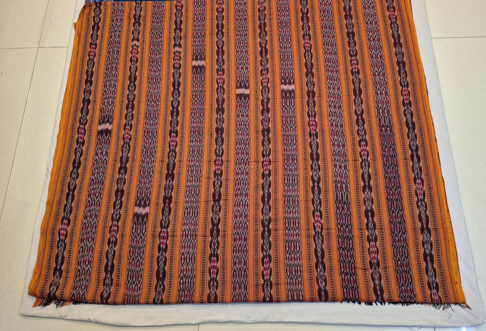 Grey Orange half half body coloured Odisha Ikat saree with cotton ikat blouse piece