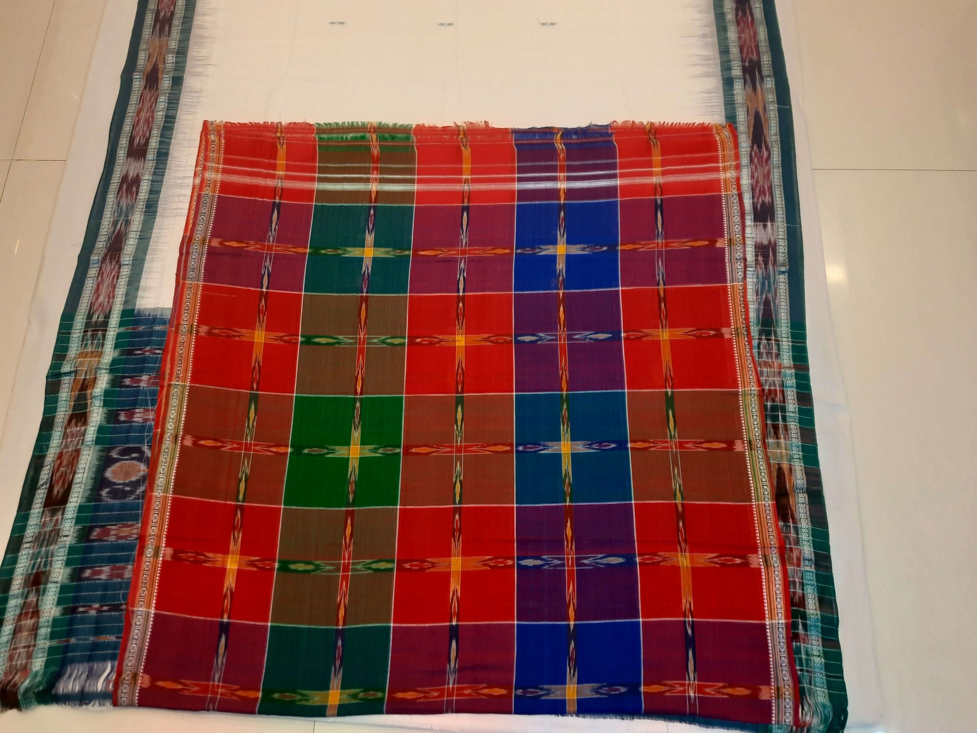 White and Green Cotton Odisha Ikat saree with mix match blouse piece