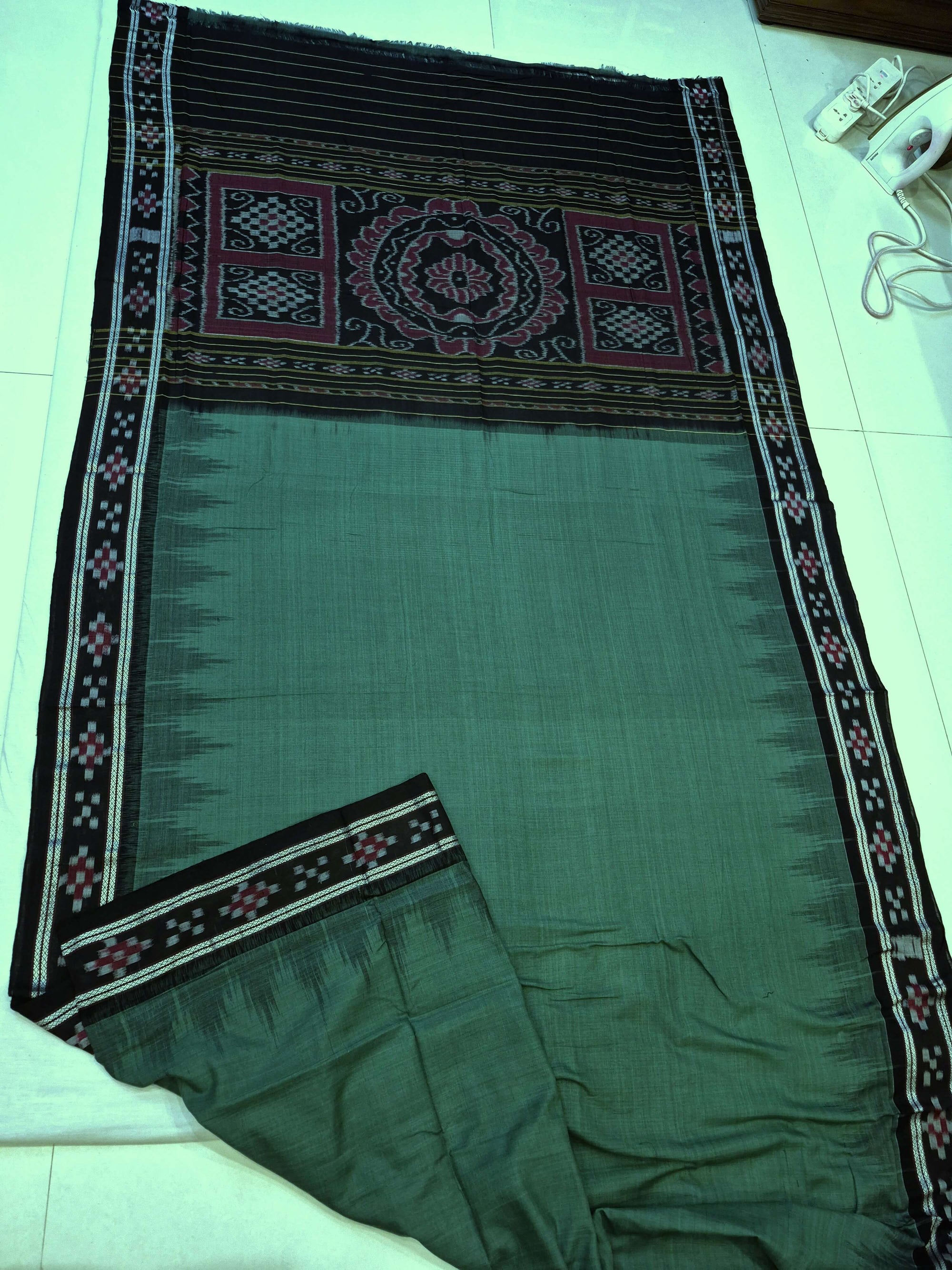Green Black Odisha Ikat saree with cotton ikat blouse piece