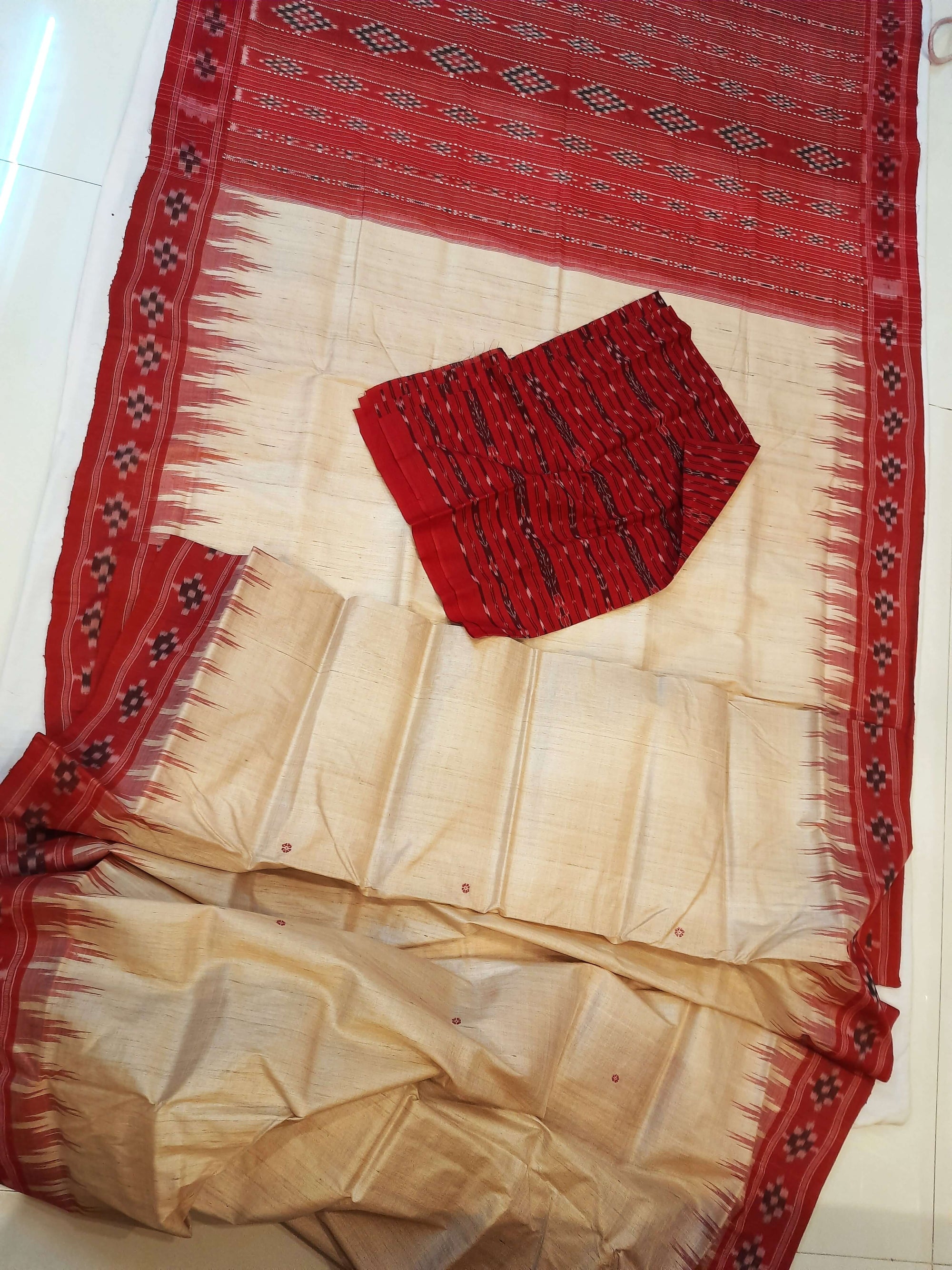 Beige with Red Tussar Silk Odisha Ikat Saree paired with cotton ikat blouse piece