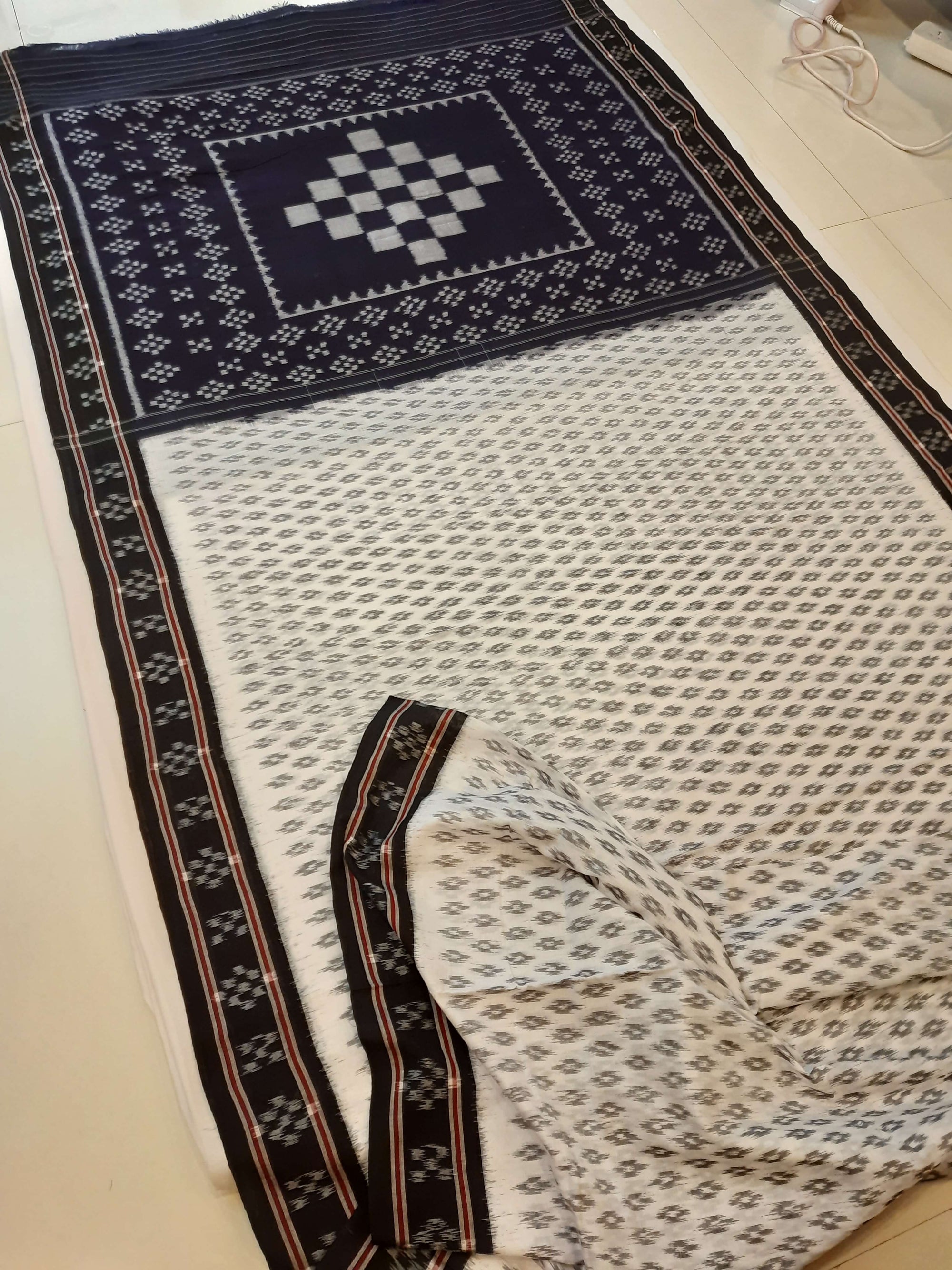 White with Black cotton Odisha Ikat Saree with mix match cotton Ikat blouse piece