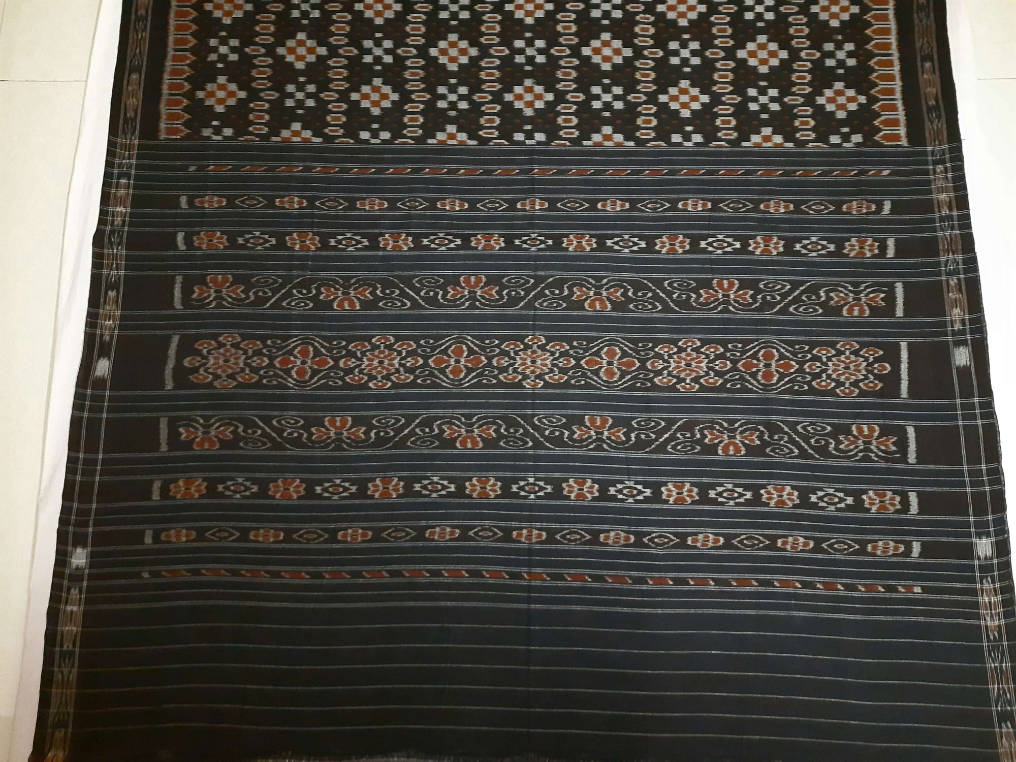 Black Cotton Ikat saree with cotton ikat blouse piece