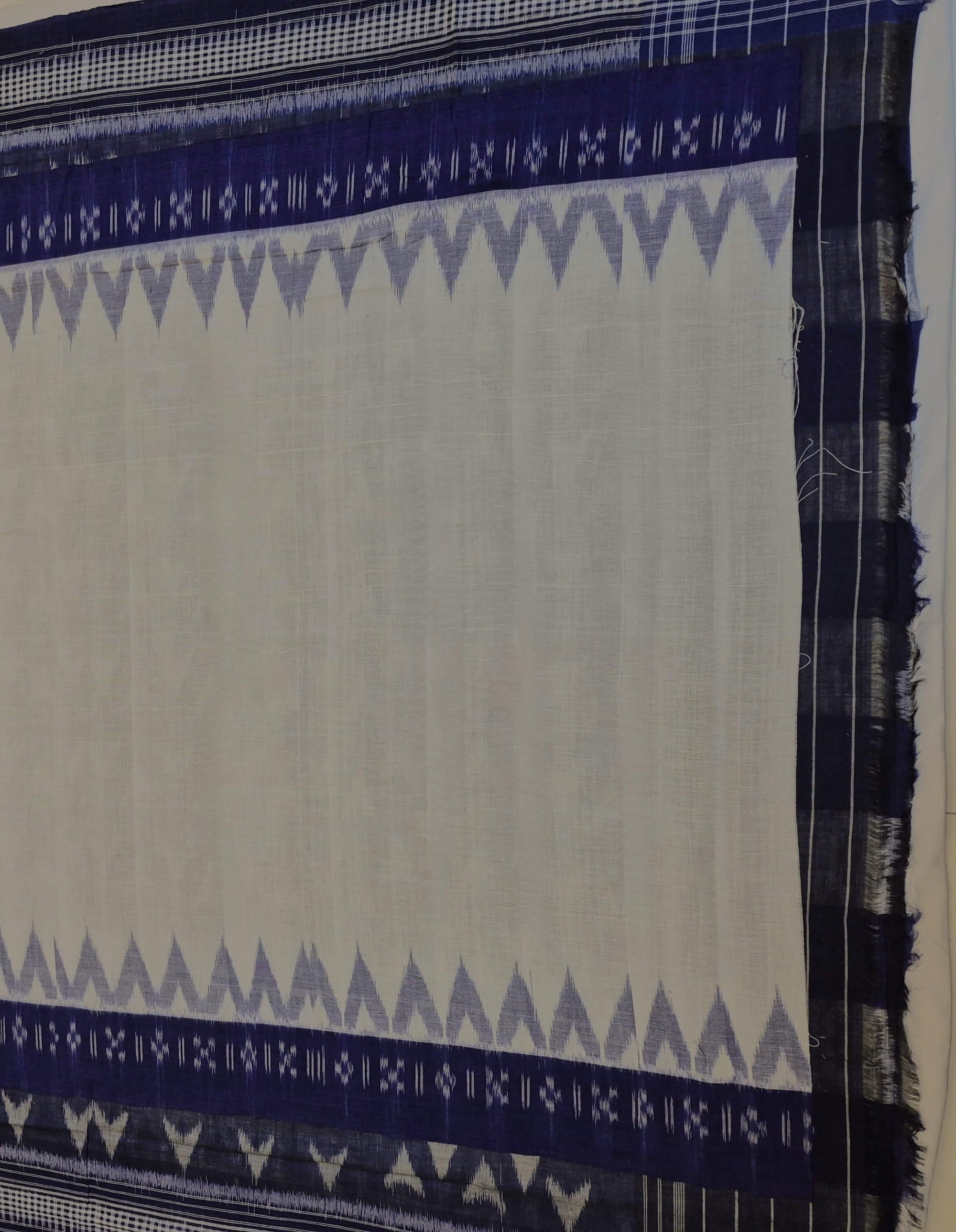 White with Blue Cotton Odisha Ikat saree with cotton ikat blouse piece