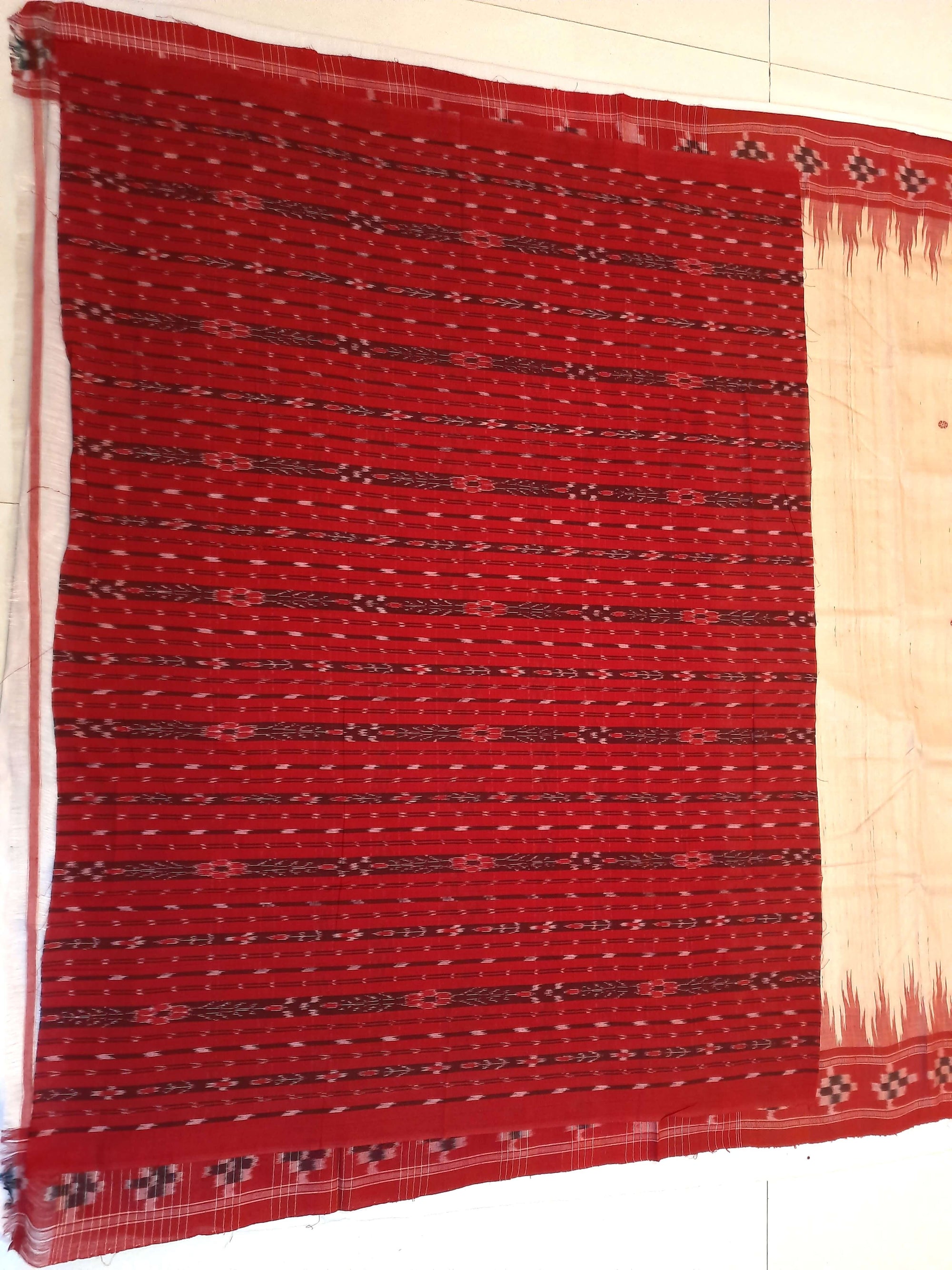Beige with Red Tussar Silk Odisha Ikat Saree paired with cotton ikat blouse piece