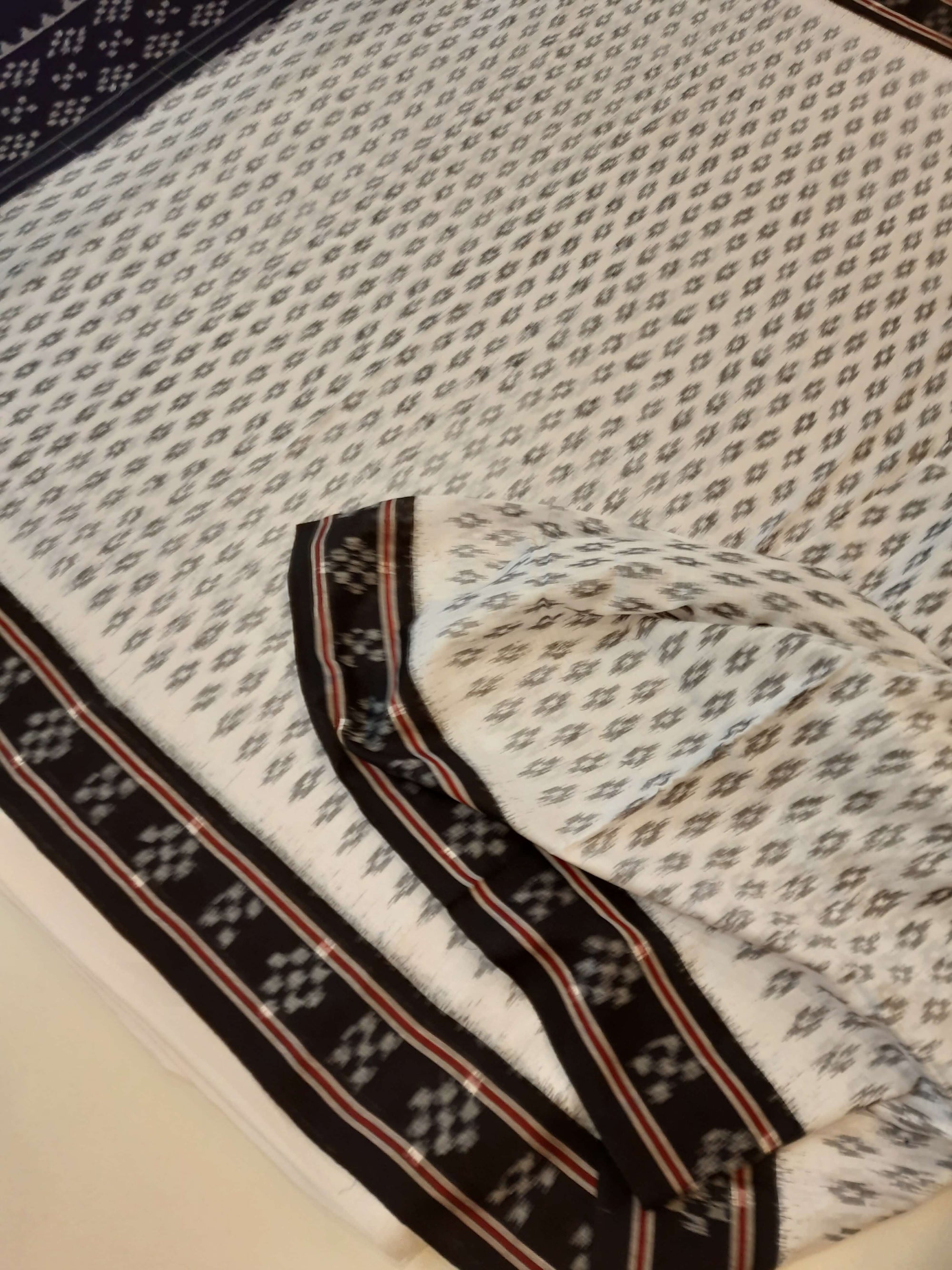 White with Black cotton Odisha Ikat Saree with mix match cotton Ikat blouse piece