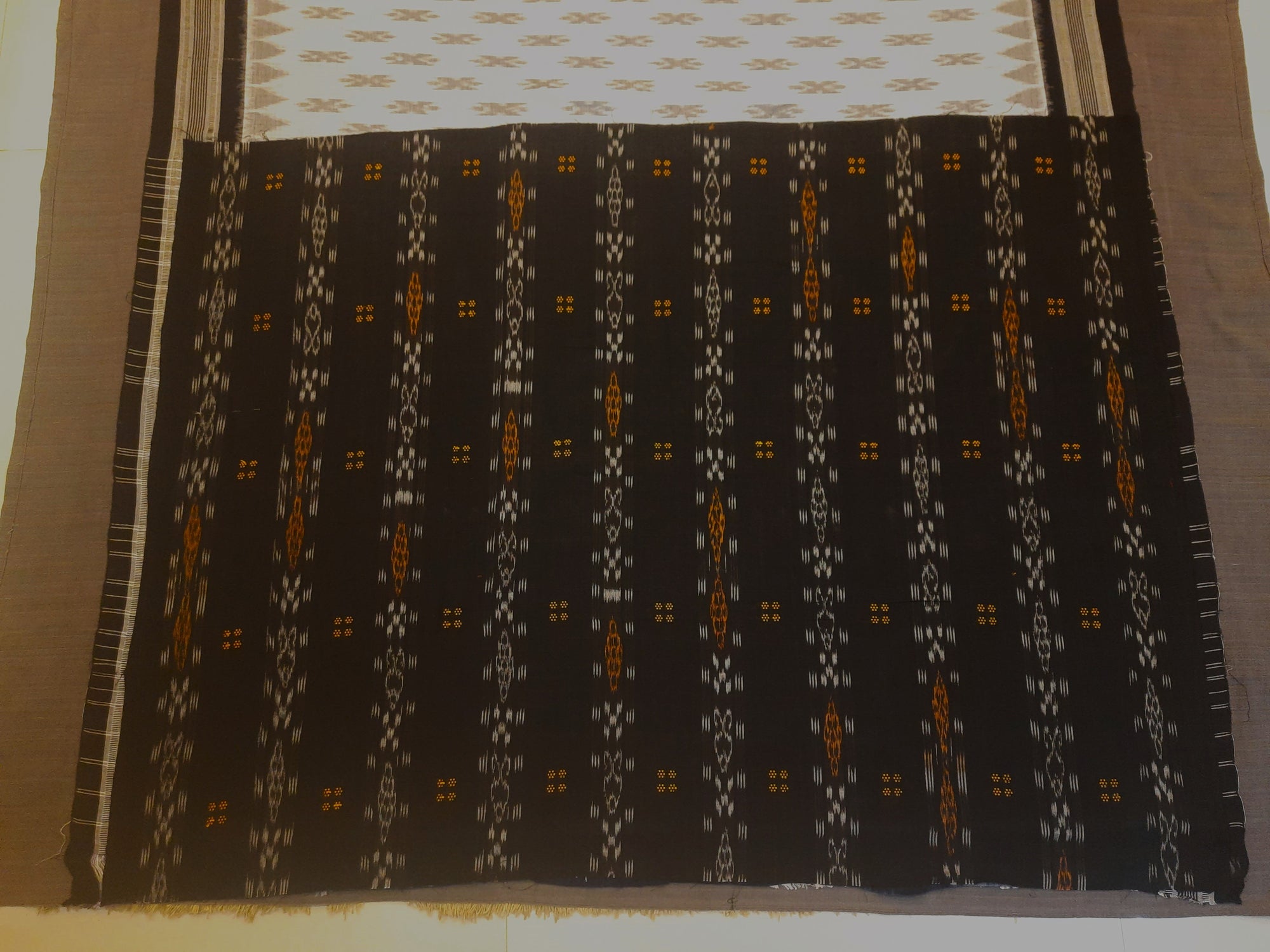 White and Black Cotton Odisha Ikat saree  with mix match cotton ikat blouse piece