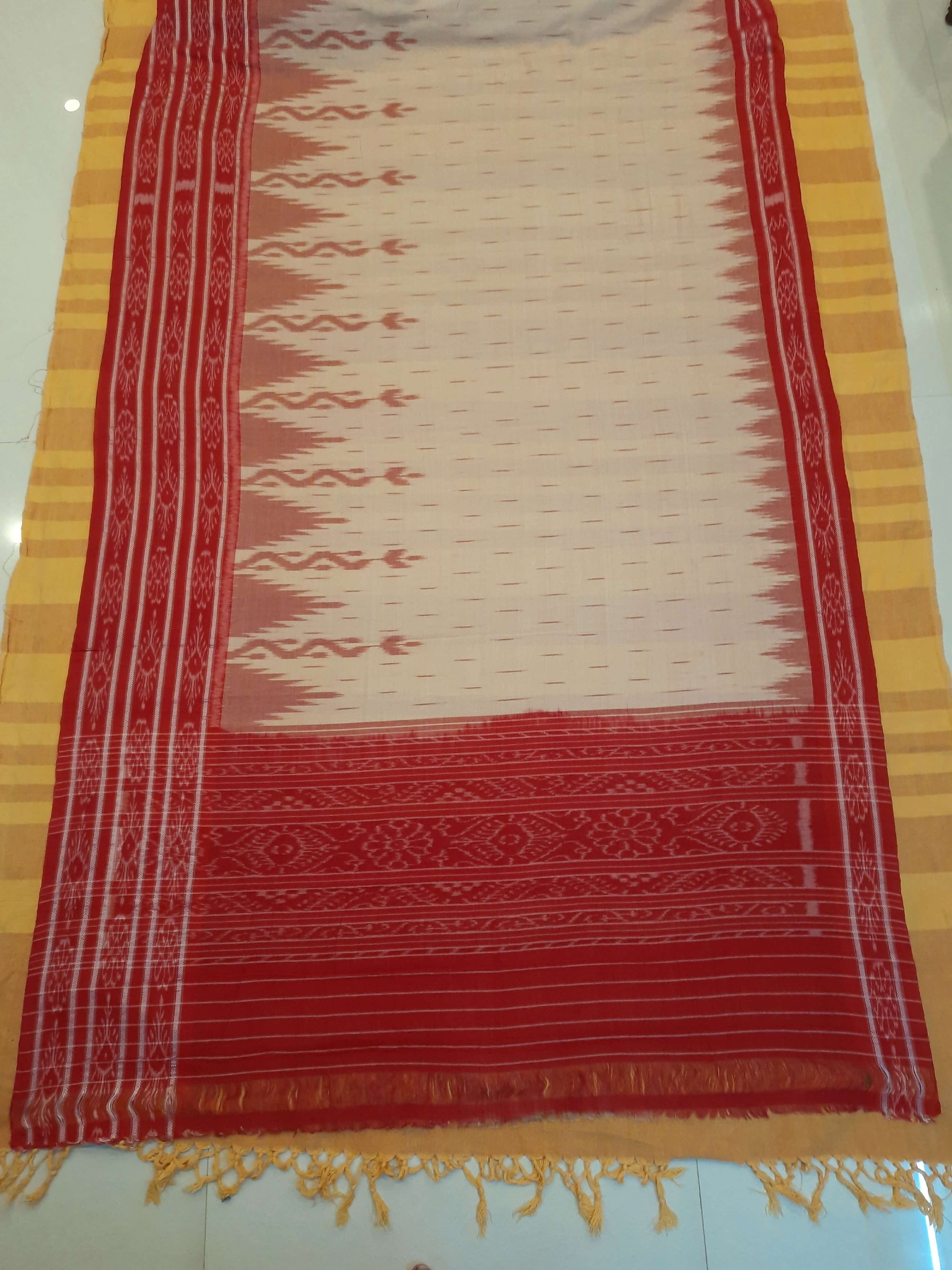 Beige wide border Cotton Odisha Ikat saree  with mix match cotton ikat blouse