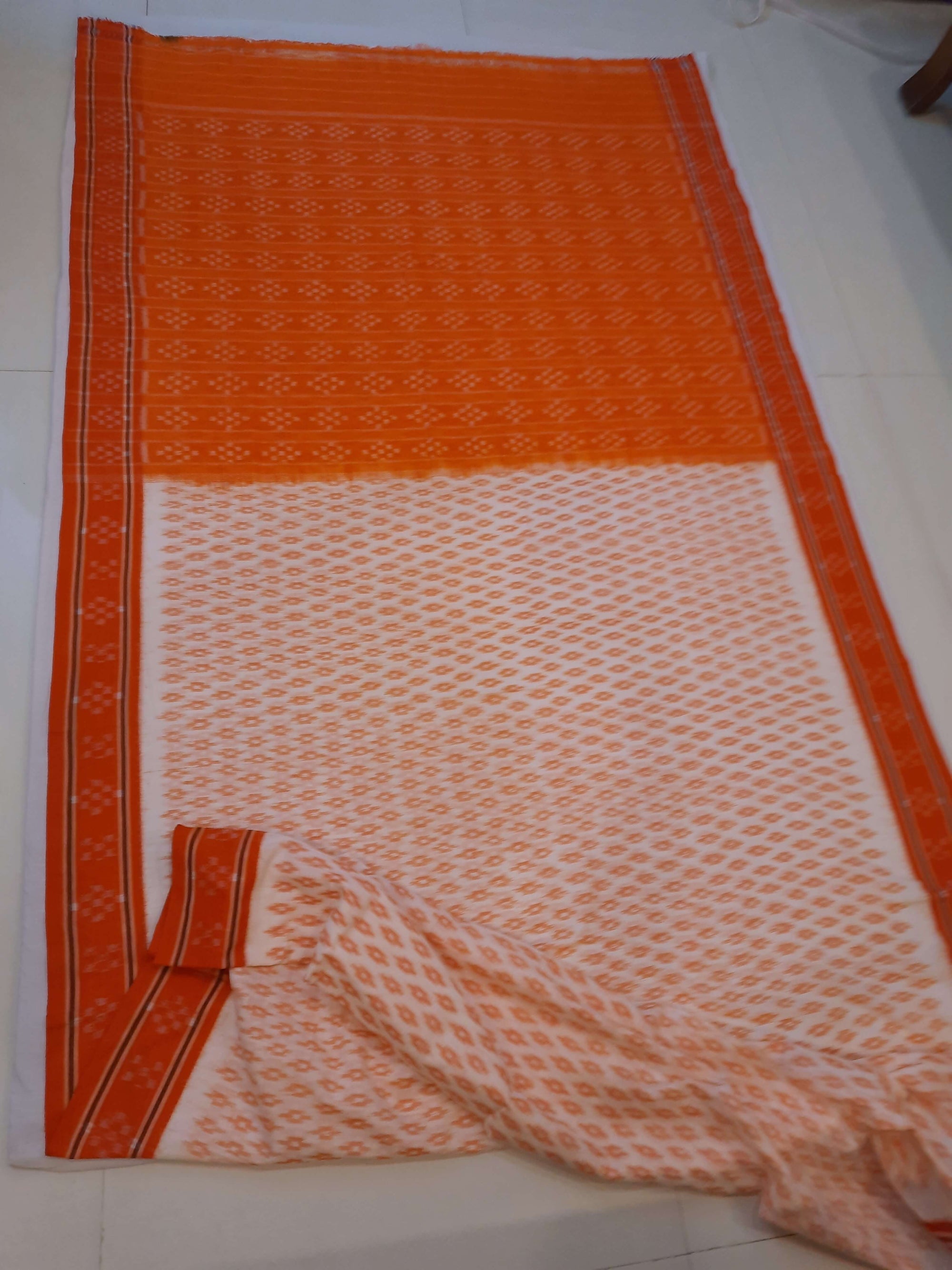 White with Orange cotton Odisha Ikat Saree with mix match cotton Ikat blouse piece
