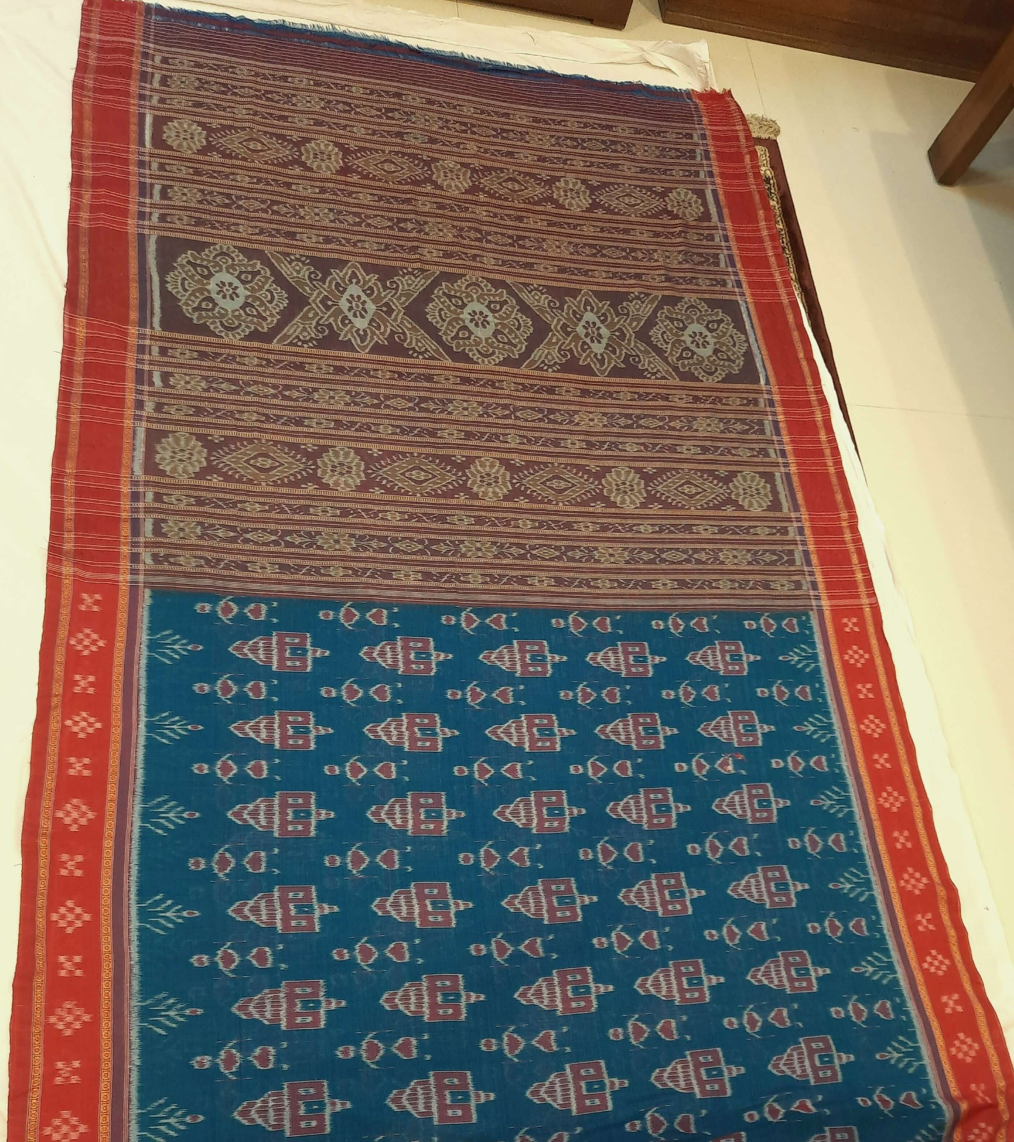 Blue and Red Odisha Ikat saree with matching cotton ikat blouse piece