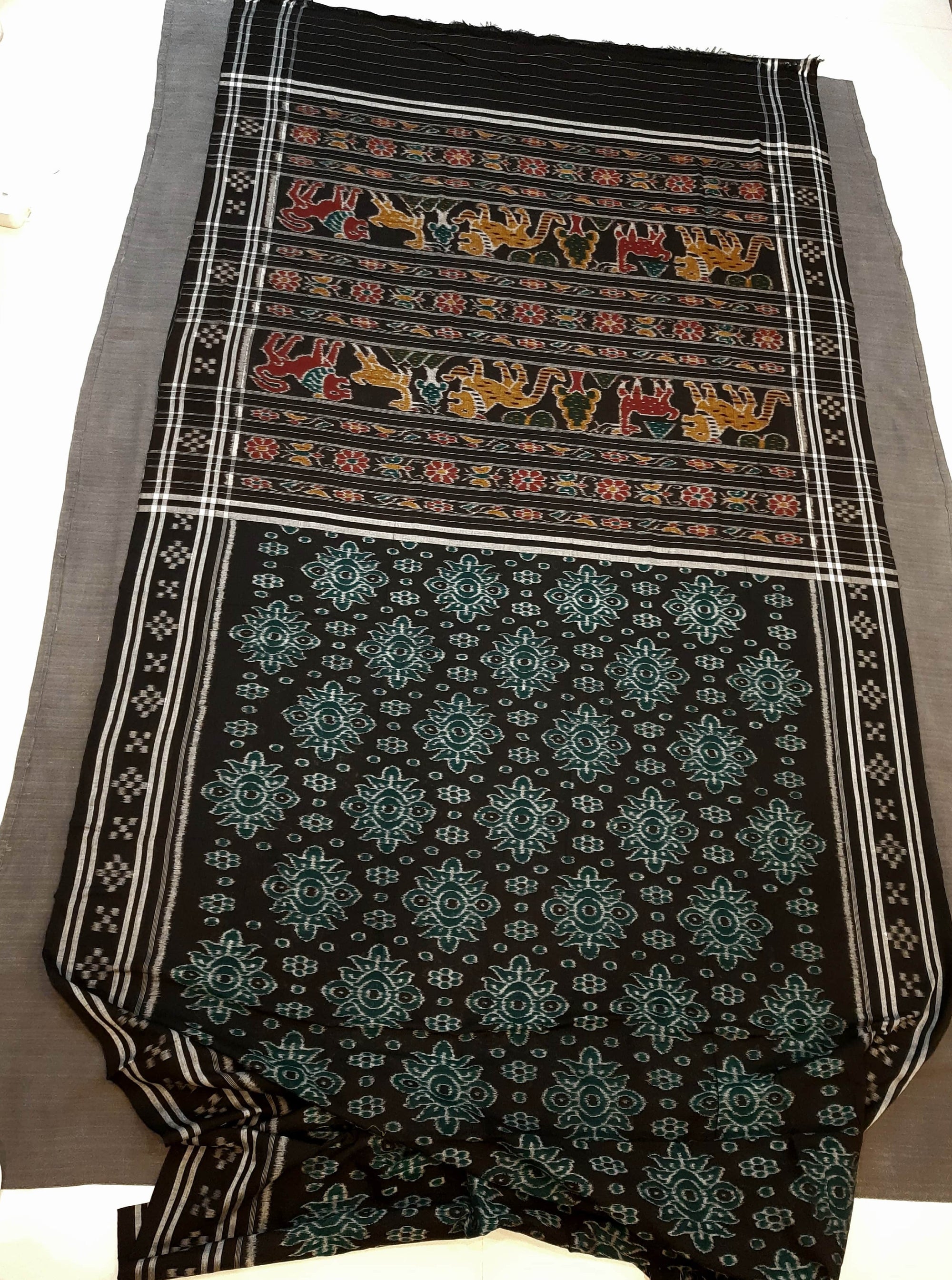 Black Odisha Ikat saree with cotton ikat blouse piece