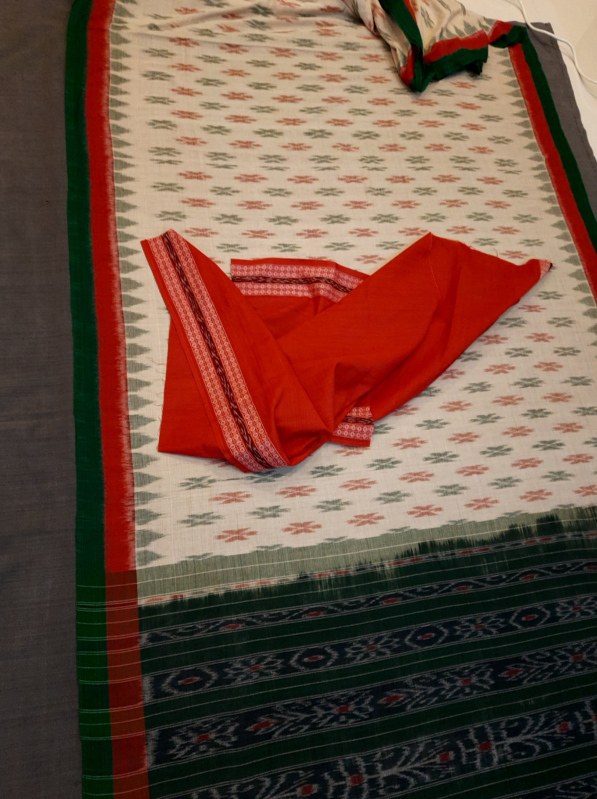 Beige with RedGreen Border Cotton Odisha Ikat saree with cotton Sambalpuri ikat blouse piece