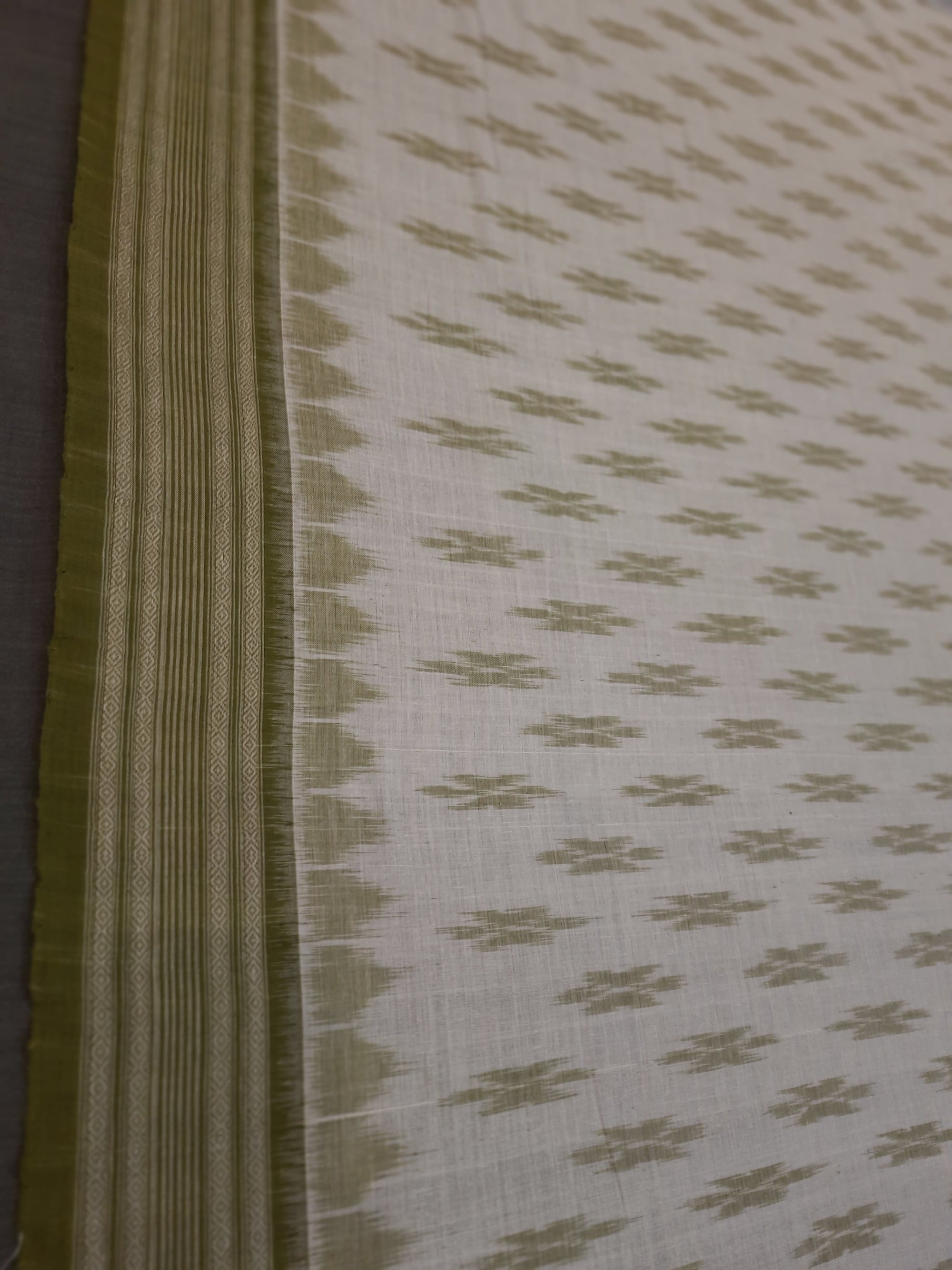 Off-white with Olive-Green Cotton Odisha Ikat saree with cotton Sambalpuri ikat blouse piece