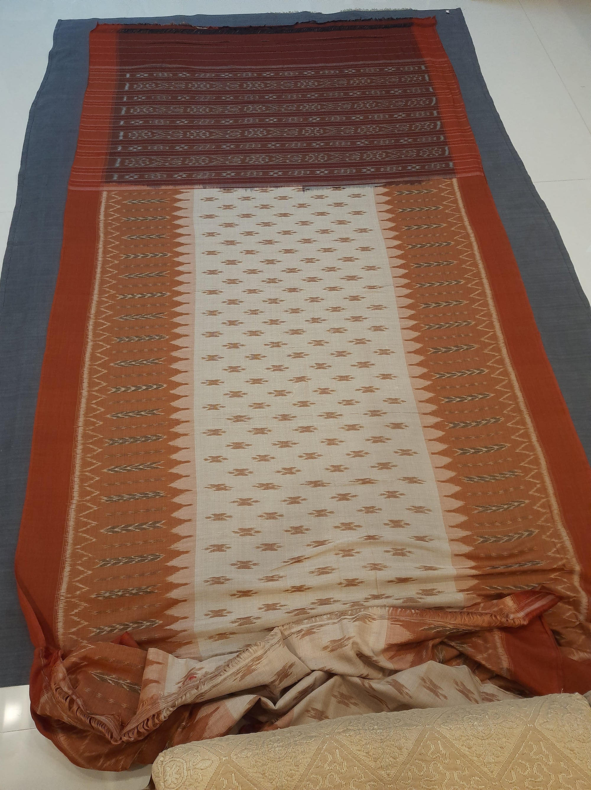 Beige Rust Orange combination Odisha Ikat saree  with cotton ikat blouse