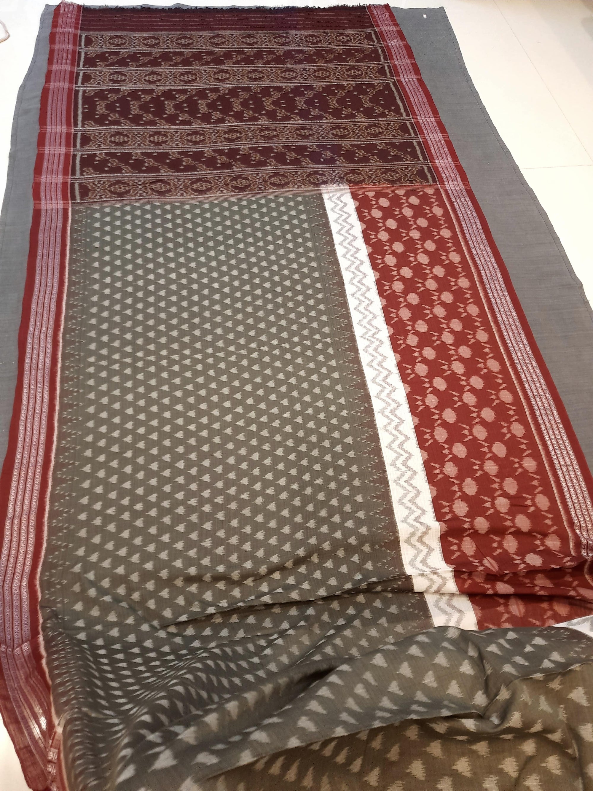 Grey wide border Odisha Ikat saree  with cotton ikat blouse