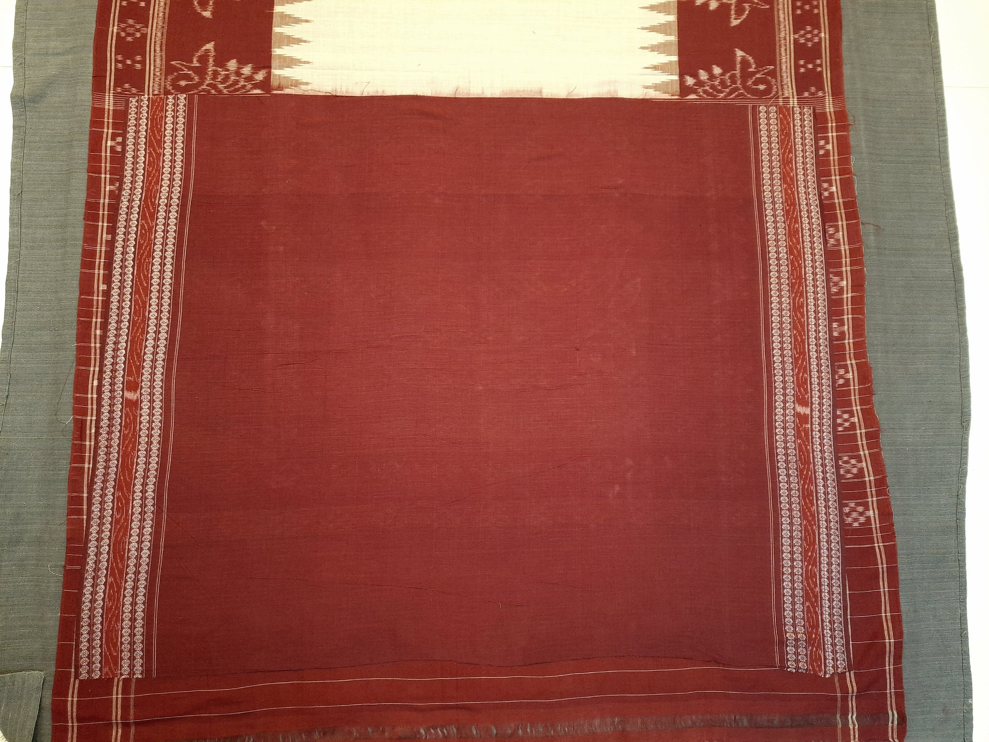 Beige and Maroon wide border Cotton Odisha Ikat saree  with  cotton ikat blouse piece