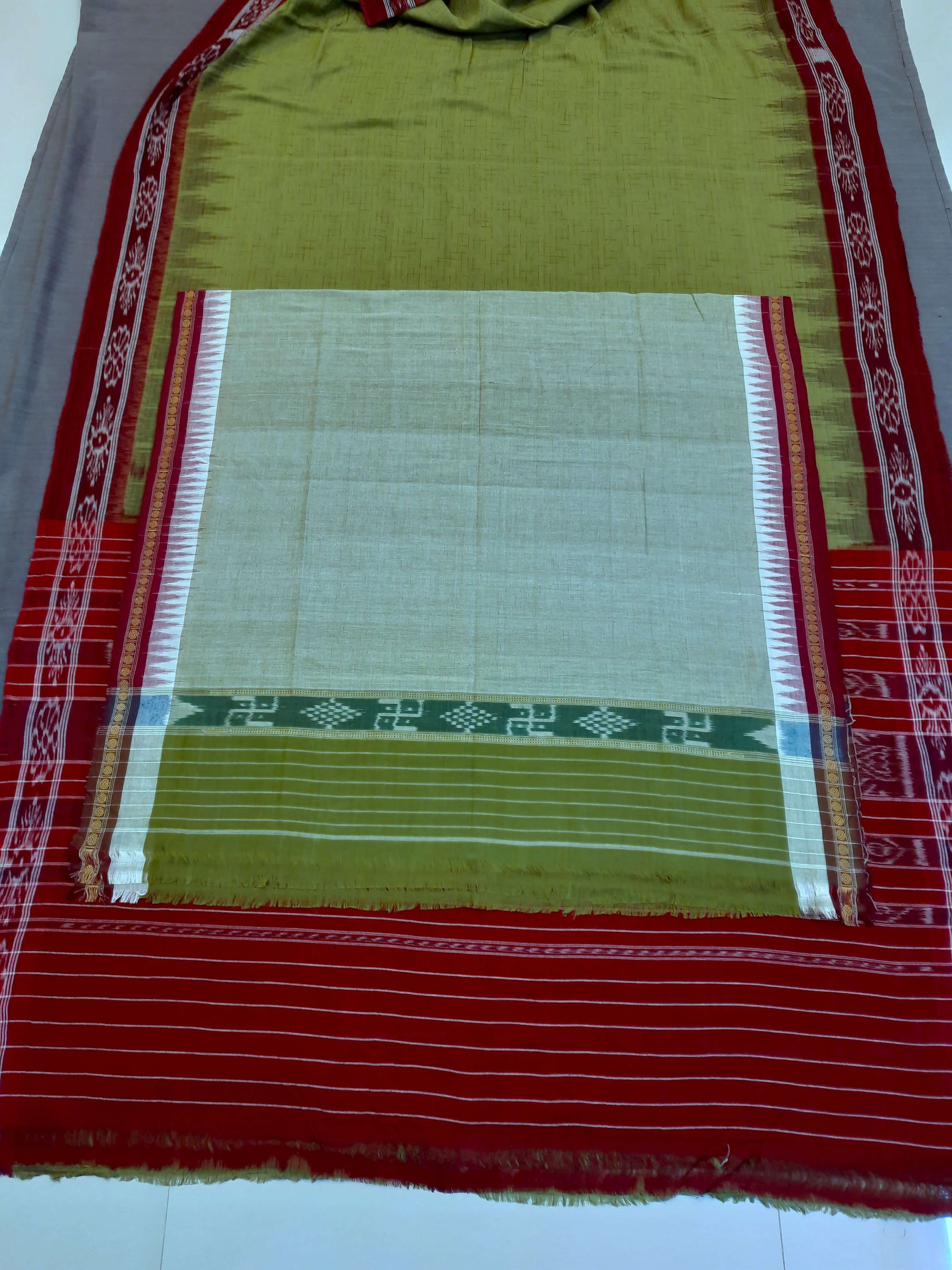 Green Odisha Ikat saree  with  Sambalpuri cotton ikat blouse piece