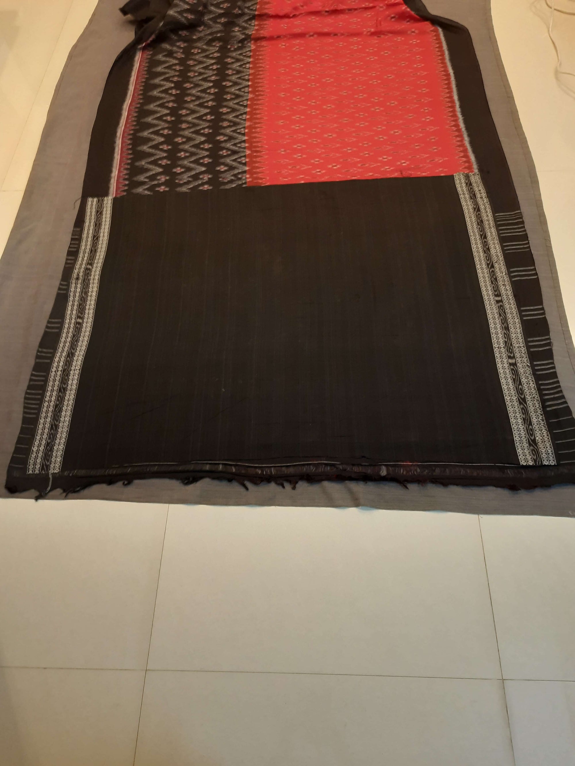 Red and Black Odisha Ikat saree with matching cotton ikat blouse piece