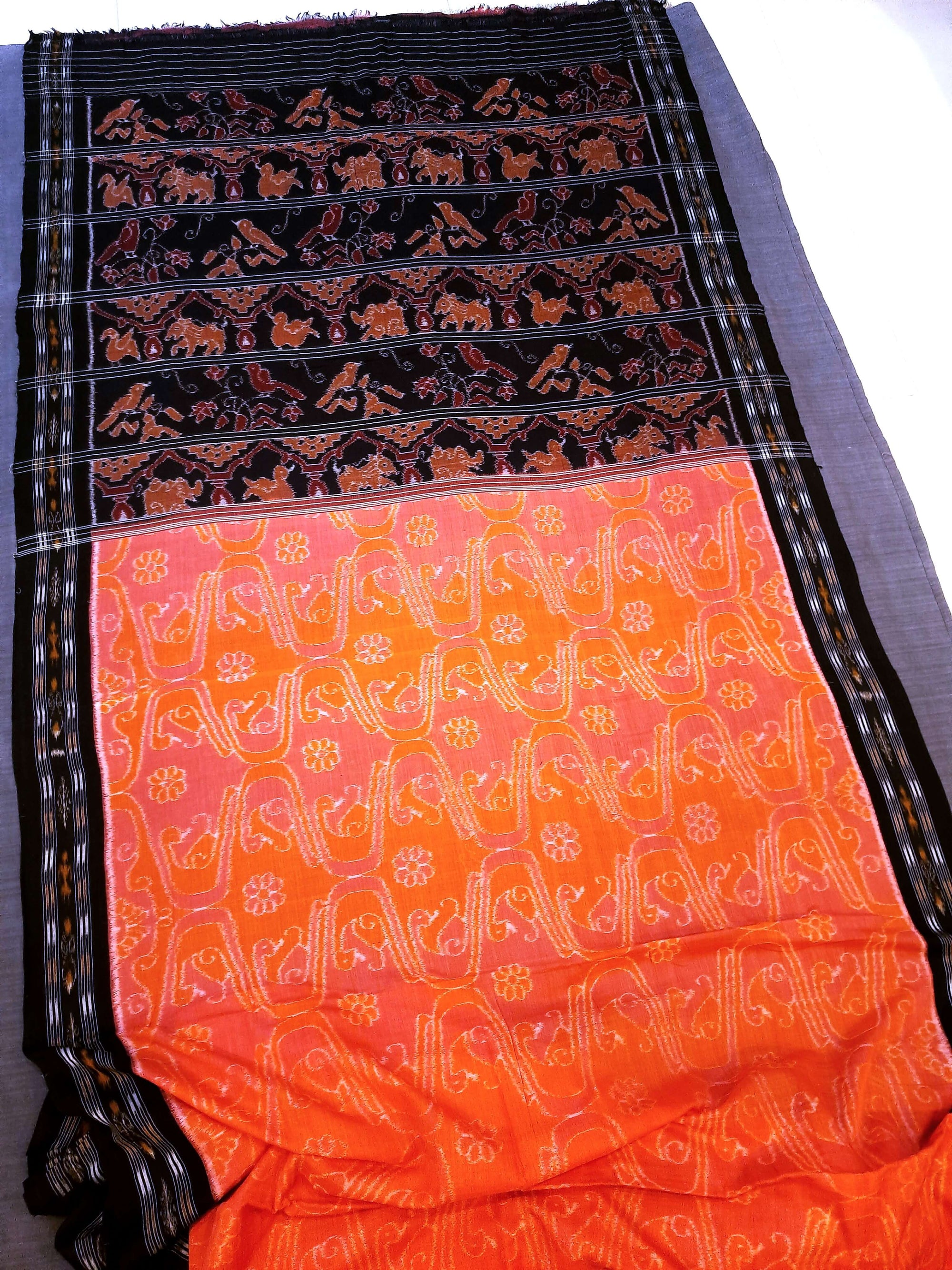 Pink and Orange Odisha Ikat saree with matching cotton ikat blouse piece