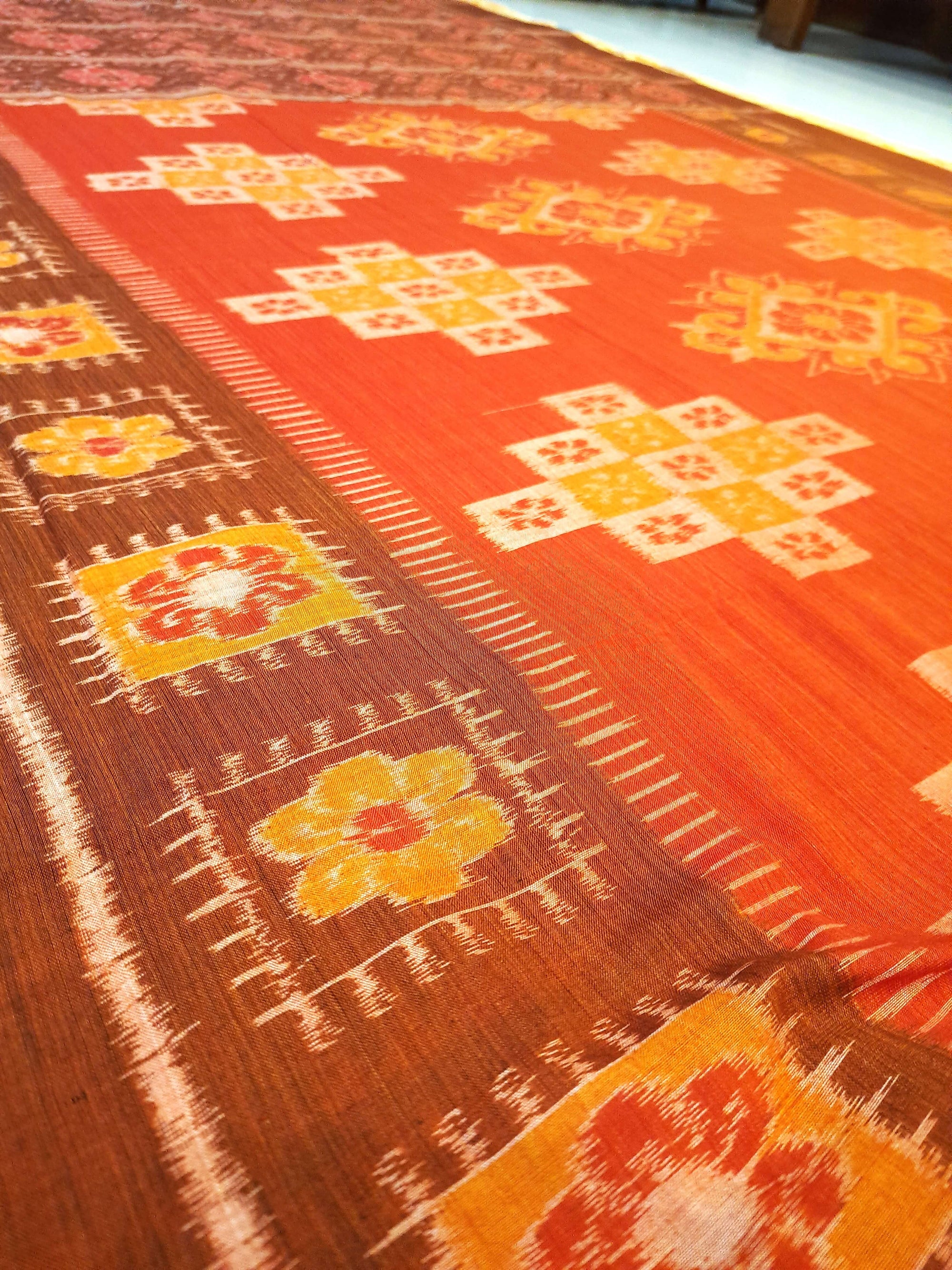 Rust with Brown colour Odisha Ikat saree  with cotton ikat blouse piece