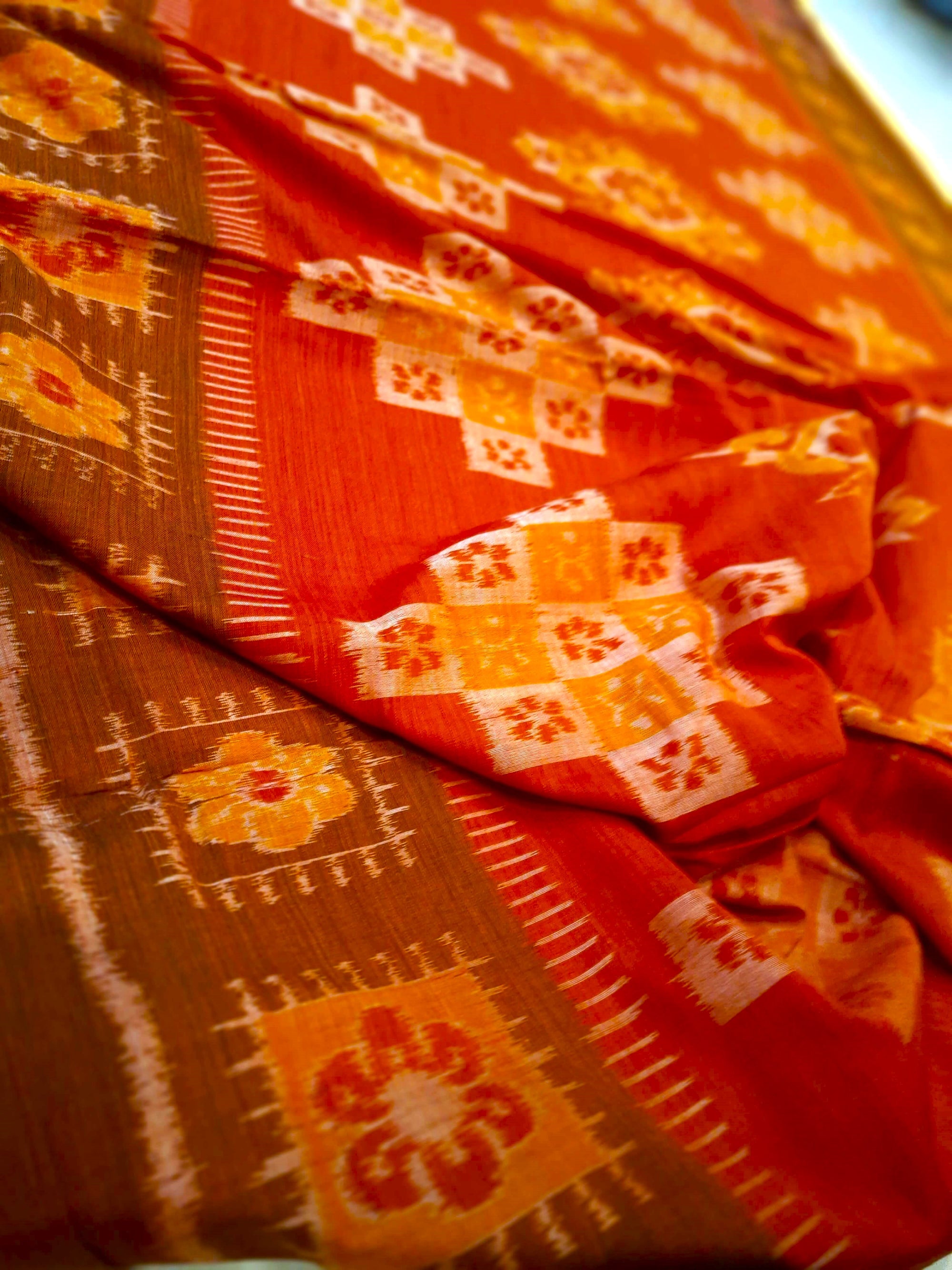 Rust with Brown colour Odisha Ikat saree  with cotton ikat blouse piece