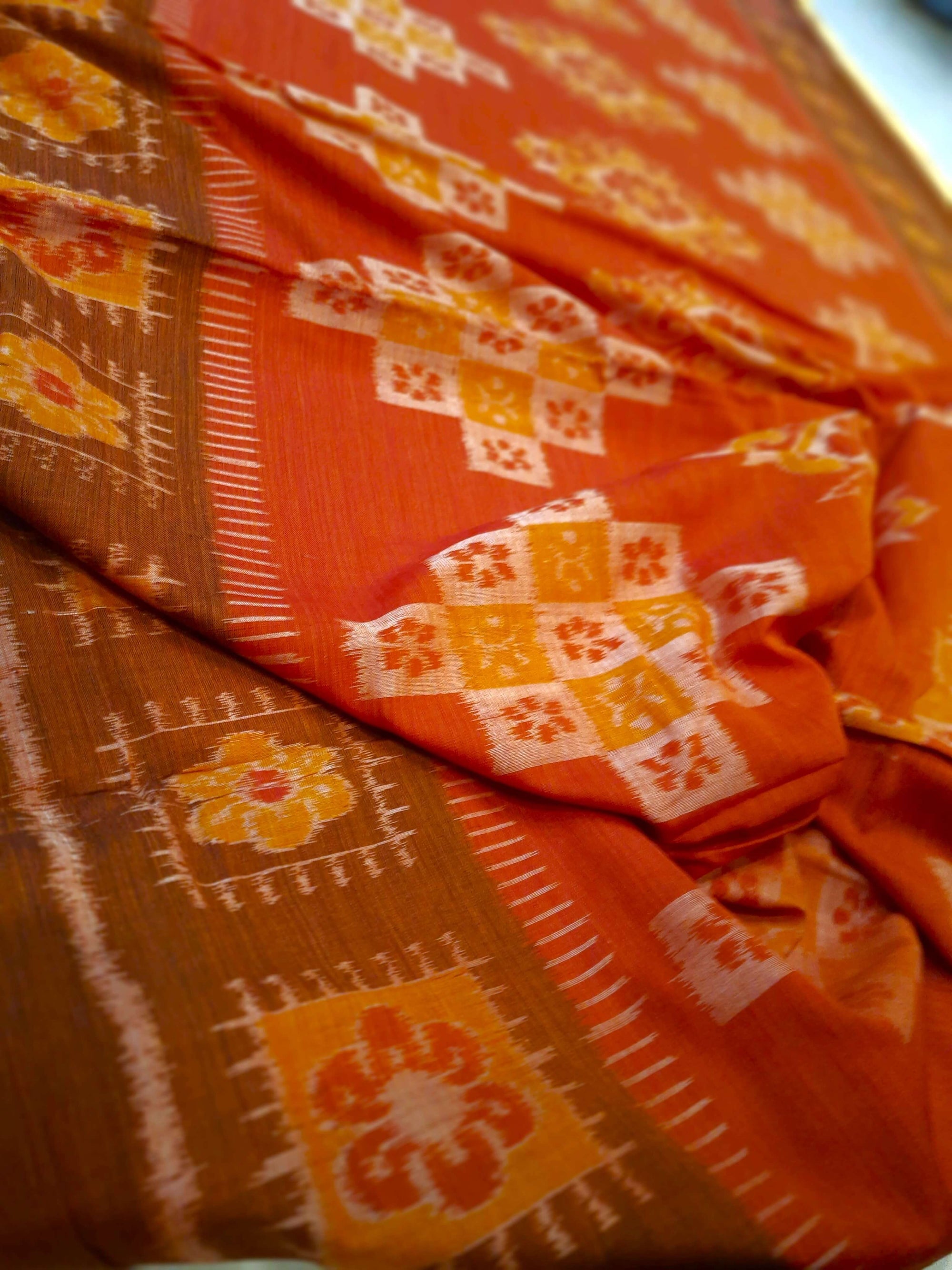 Rust with Brown colour Odisha Ikat saree  with cotton ikat blouse piece