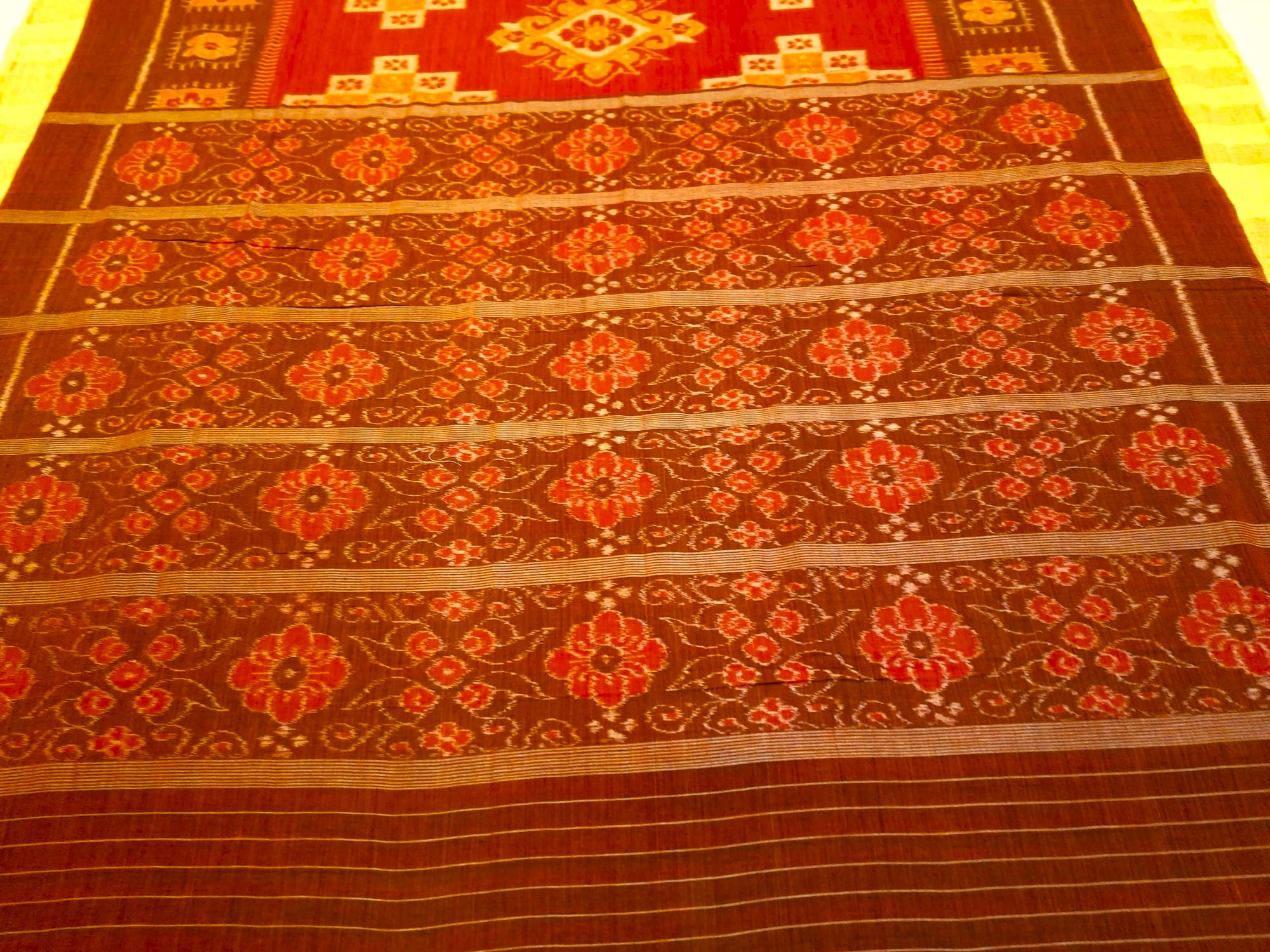 Rust with Brown colour Odisha Ikat saree  with cotton ikat blouse piece