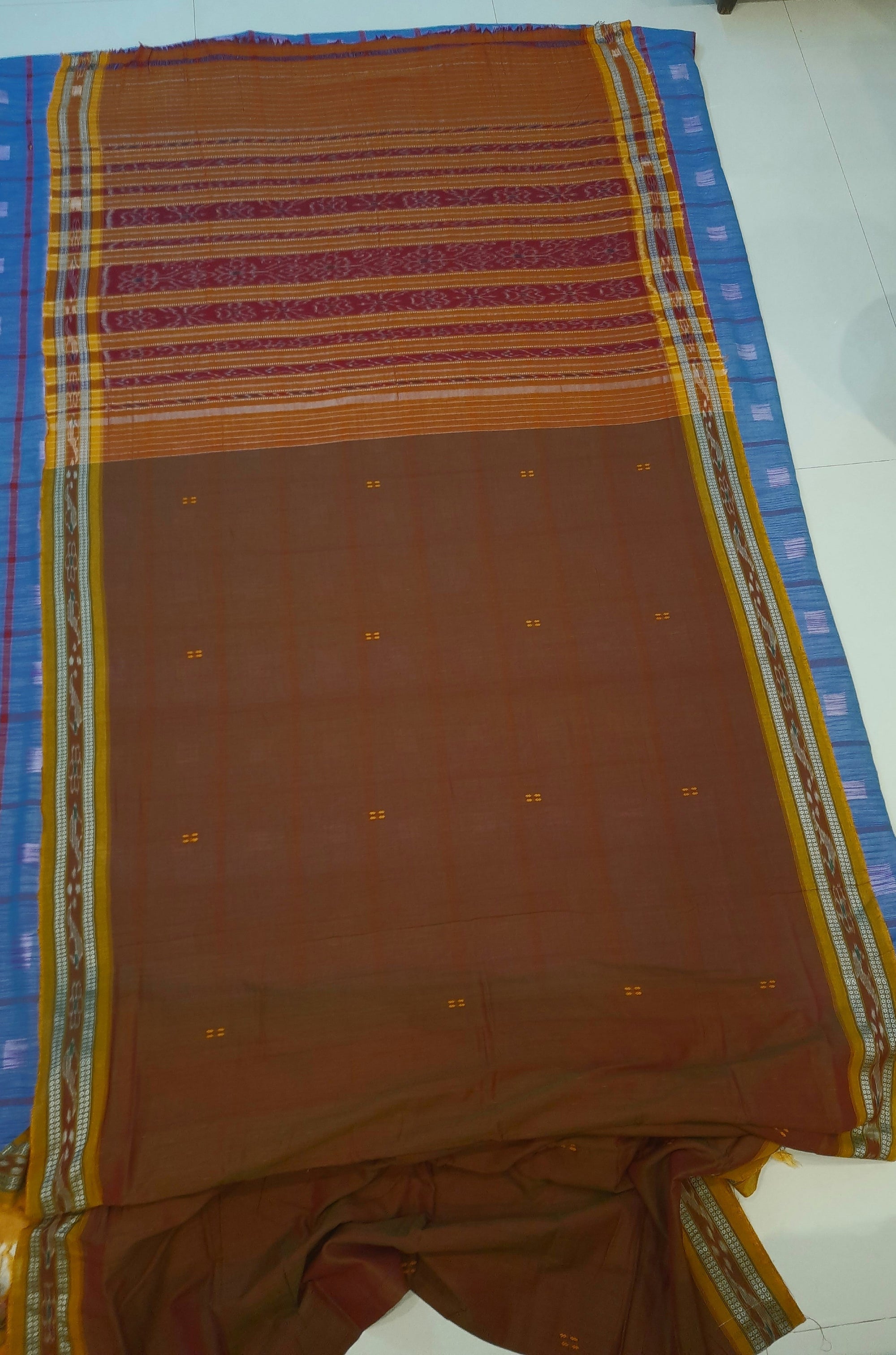 Brown with Golden coloured Odisha Ikat saree  with cotton ikat blouse piece